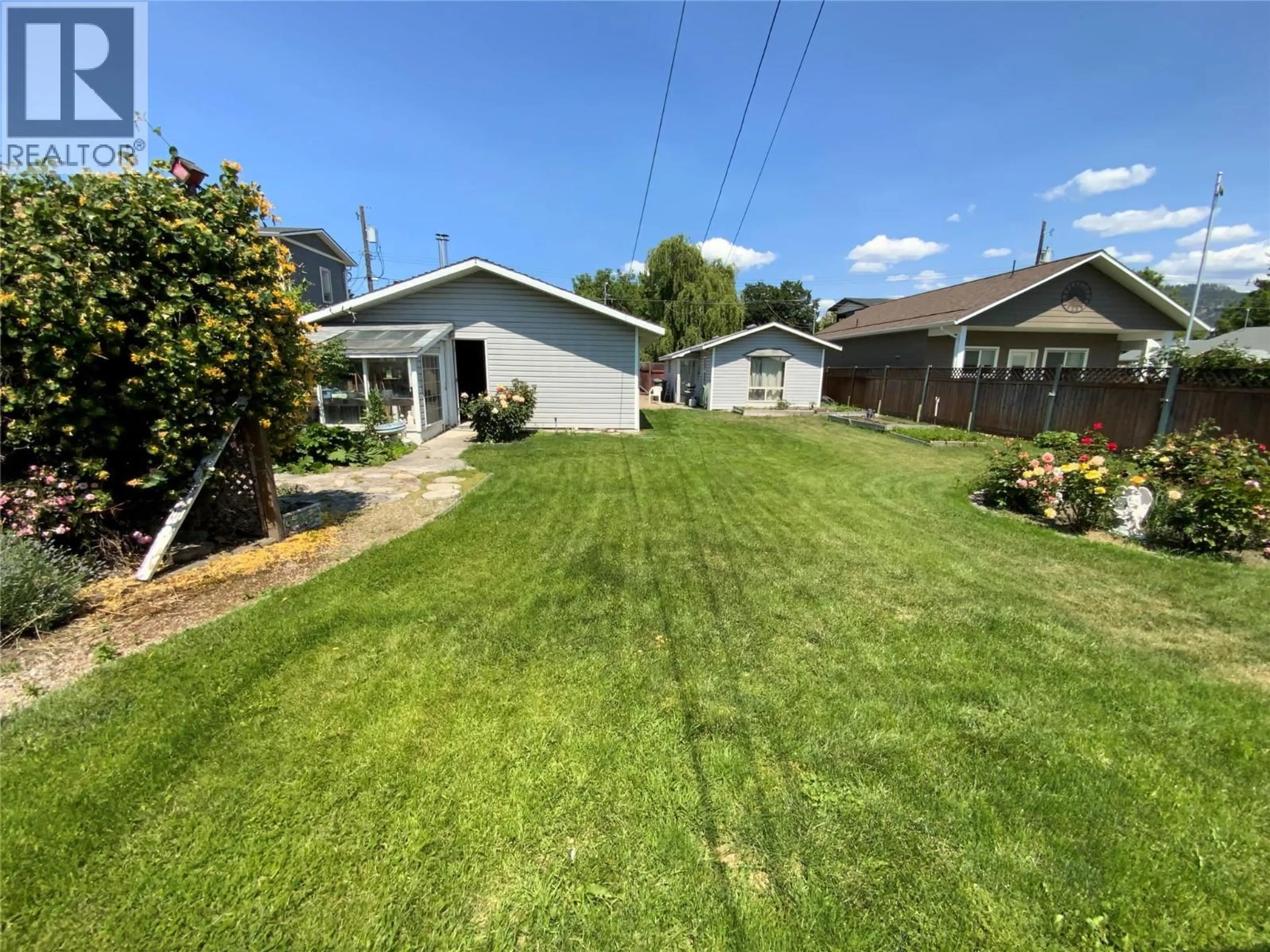A pic from outside/outdoor area/front of a property/back of a property/a pic from drone, street for 449 CONKLIN AVENUE, Penticton British Columbia V2A2T3
