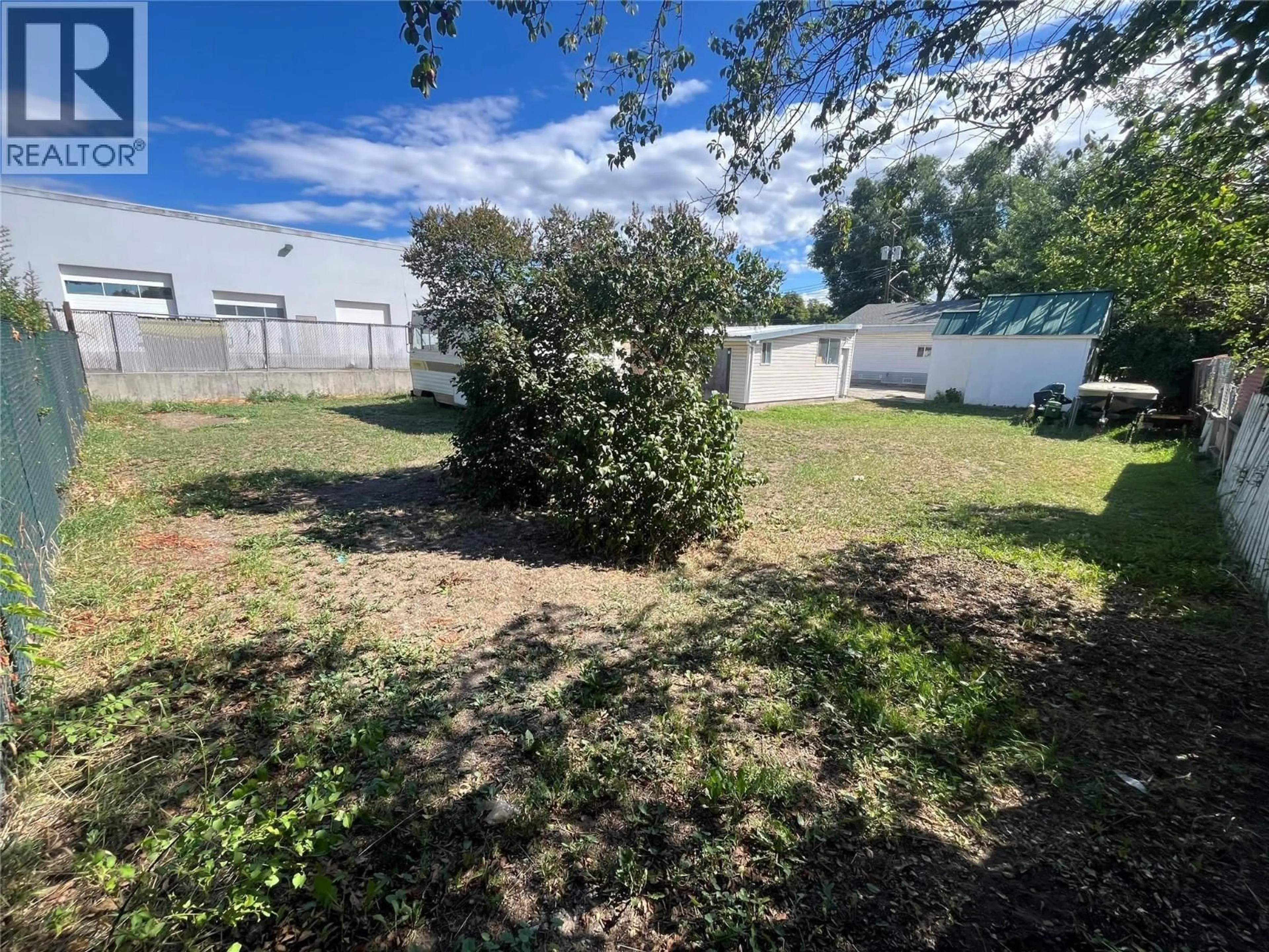 A pic from outside/outdoor area/front of a property/back of a property/a pic from drone, street for 170 MILLS ROAD, Kelowna British Columbia V1Y6X6