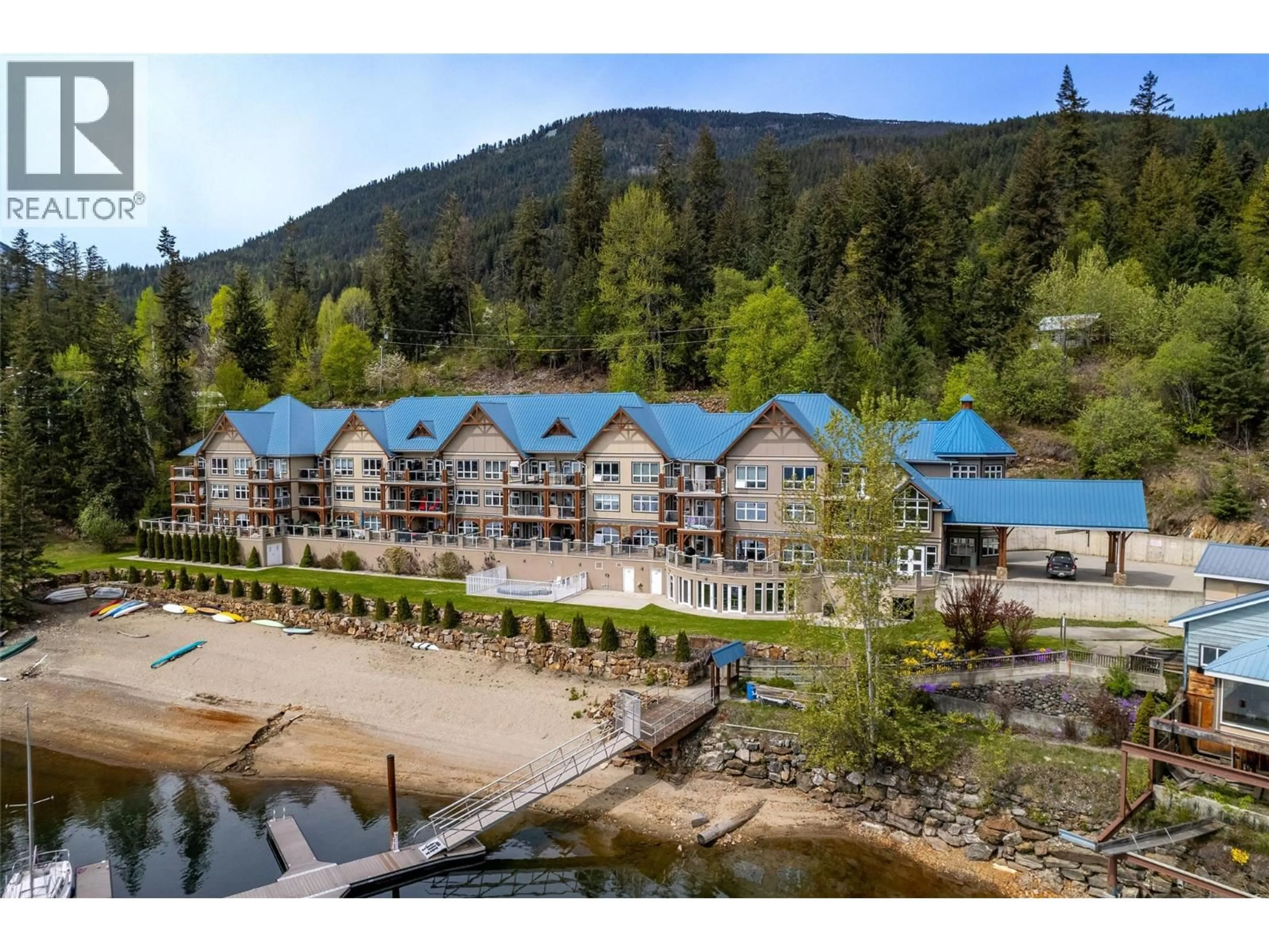 A pic from outside/outdoor area/front of a property/back of a property/a pic from drone, water/lake/river/ocean view for 207 - 550 RAINBOW DRIVE, Kaslo British Columbia V0G1M0