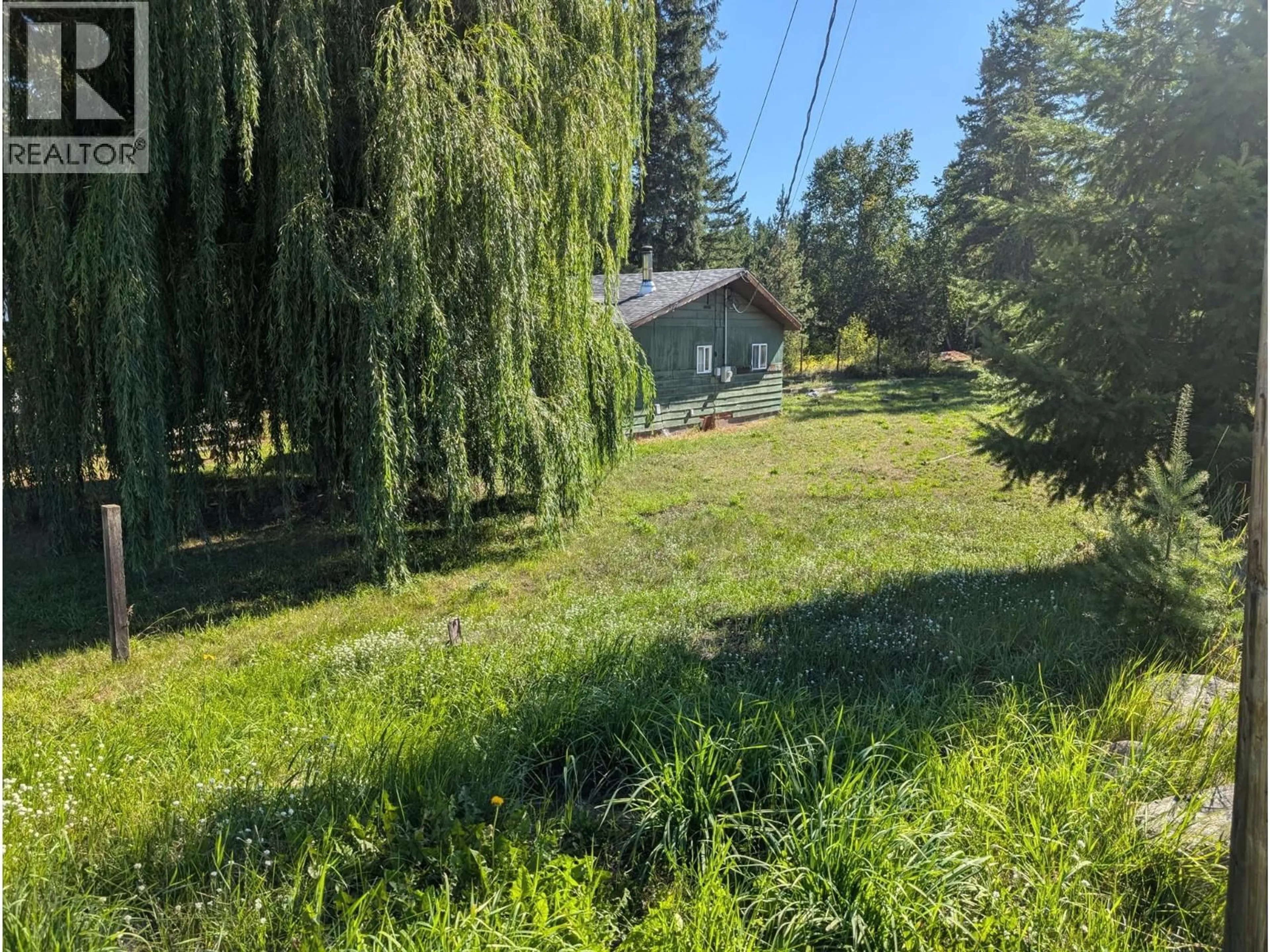 A pic from outside/outdoor area/front of a property/back of a property/a pic from drone, forest/trees view for 54 YOUNG ROAD, Clearwater British Columbia V0E1N2