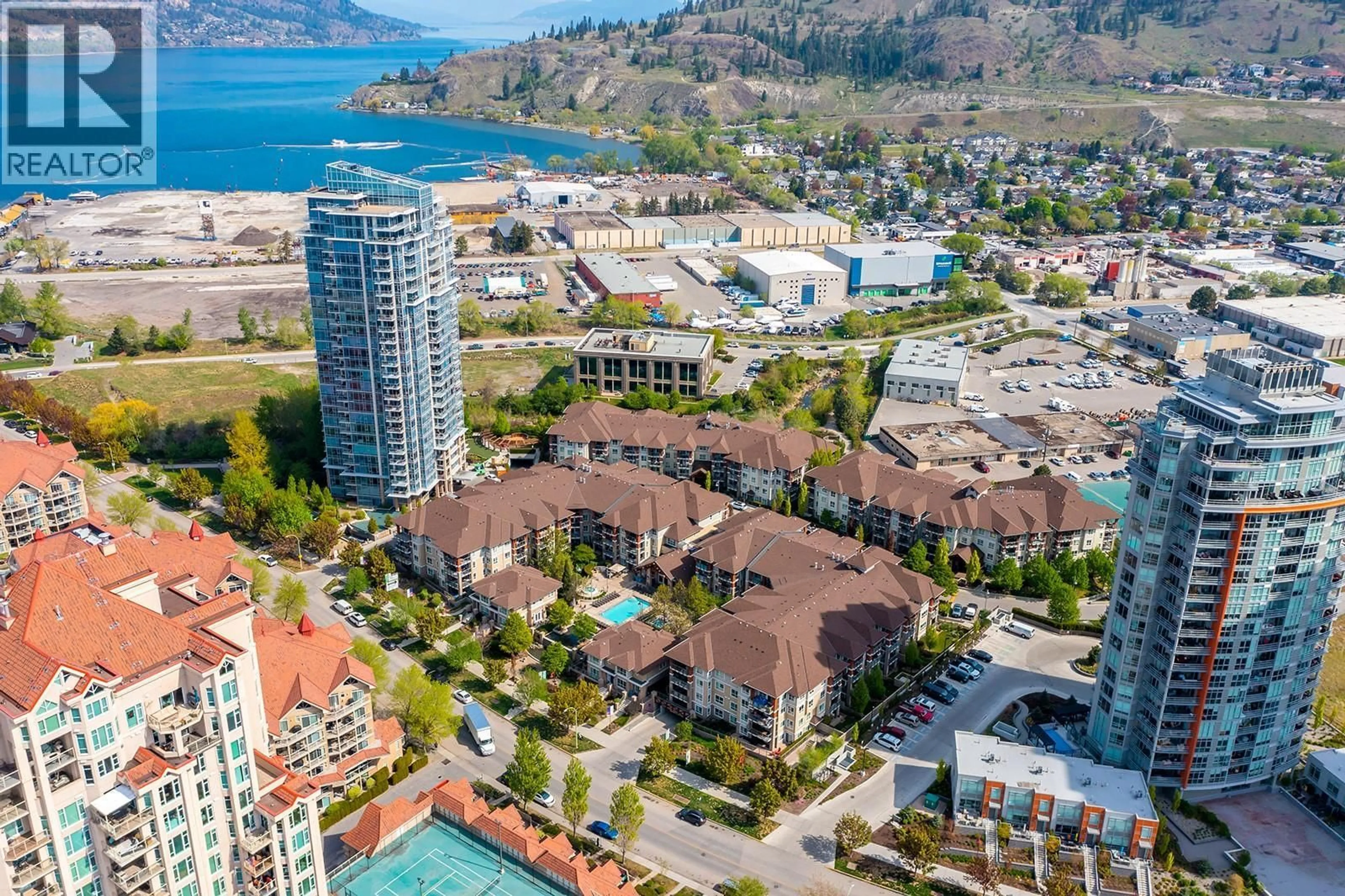 A pic from outside/outdoor area/front of a property/back of a property/a pic from drone, water/lake/river/ocean view for 431 - 1099 SUNSET DRIVE, Kelowna British Columbia V1Y9Z2