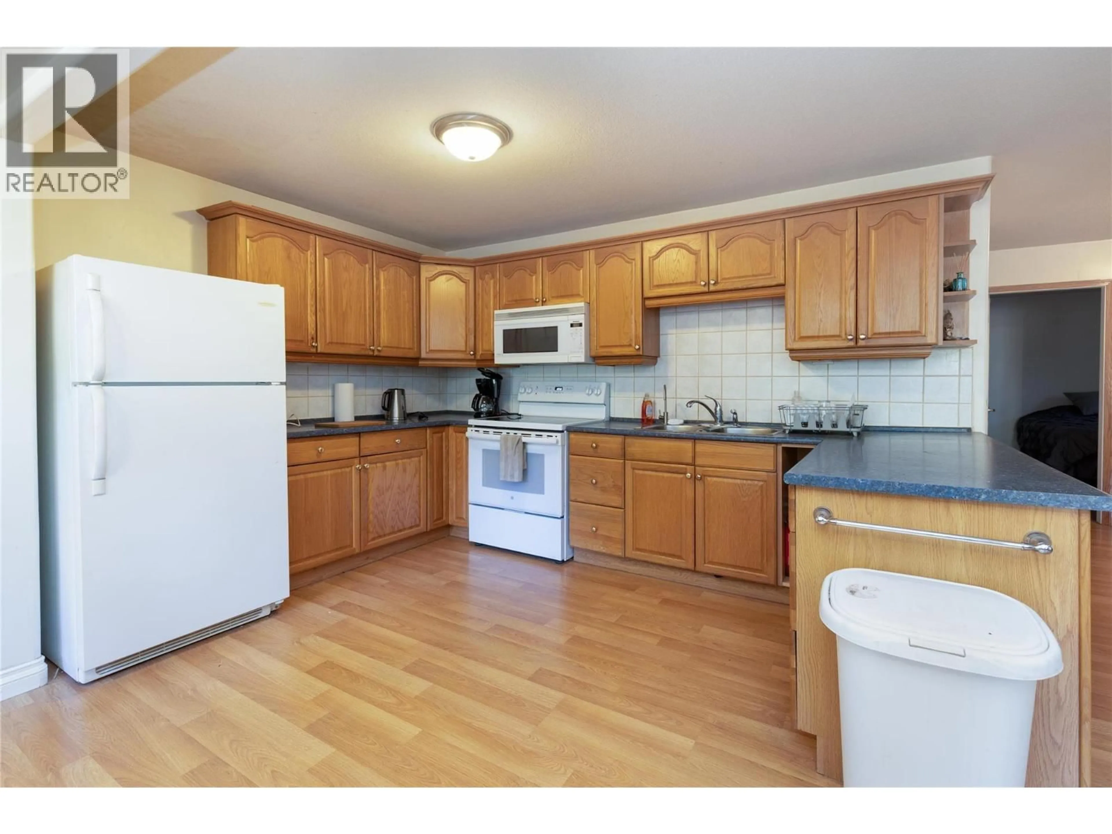 Standard kitchen, wood/laminate floor for 8336 SKIMIKIN ROAD, Chase British Columbia V0E1M1