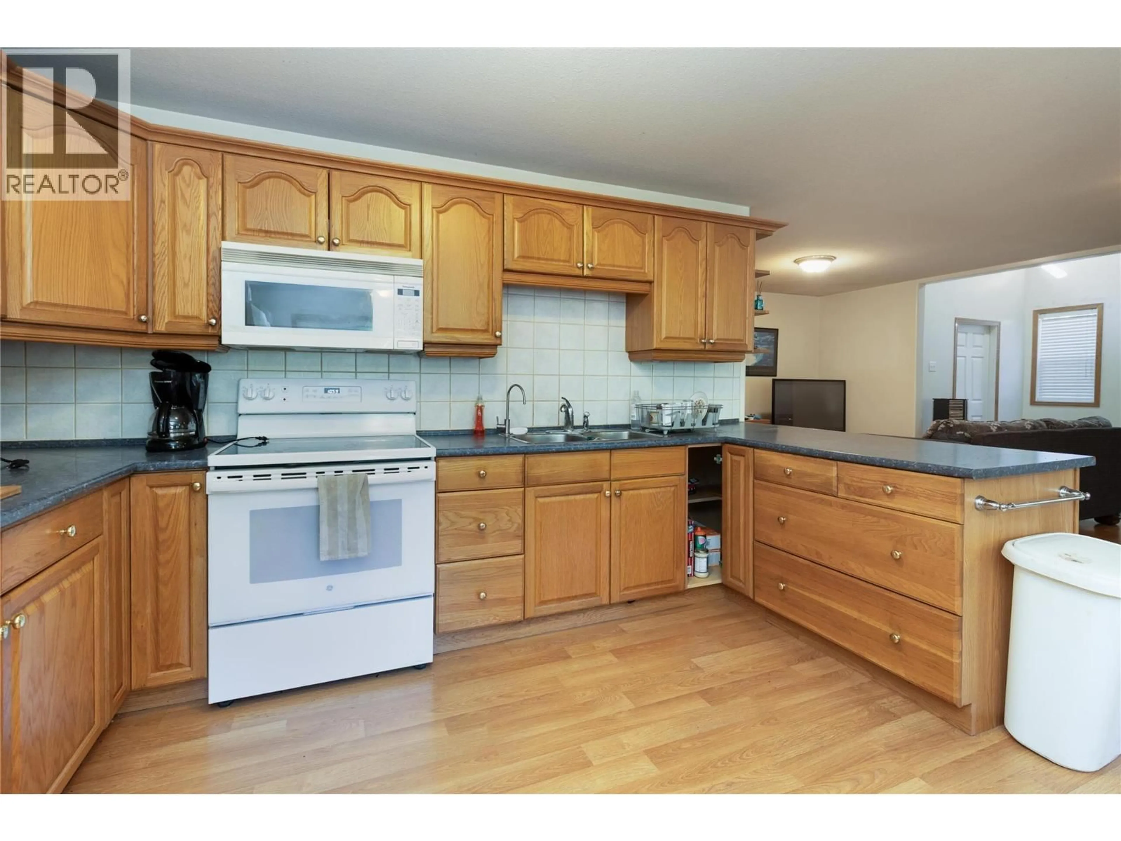 Standard kitchen, wood/laminate floor for 8336 SKIMIKIN ROAD, Chase British Columbia V0E1M1