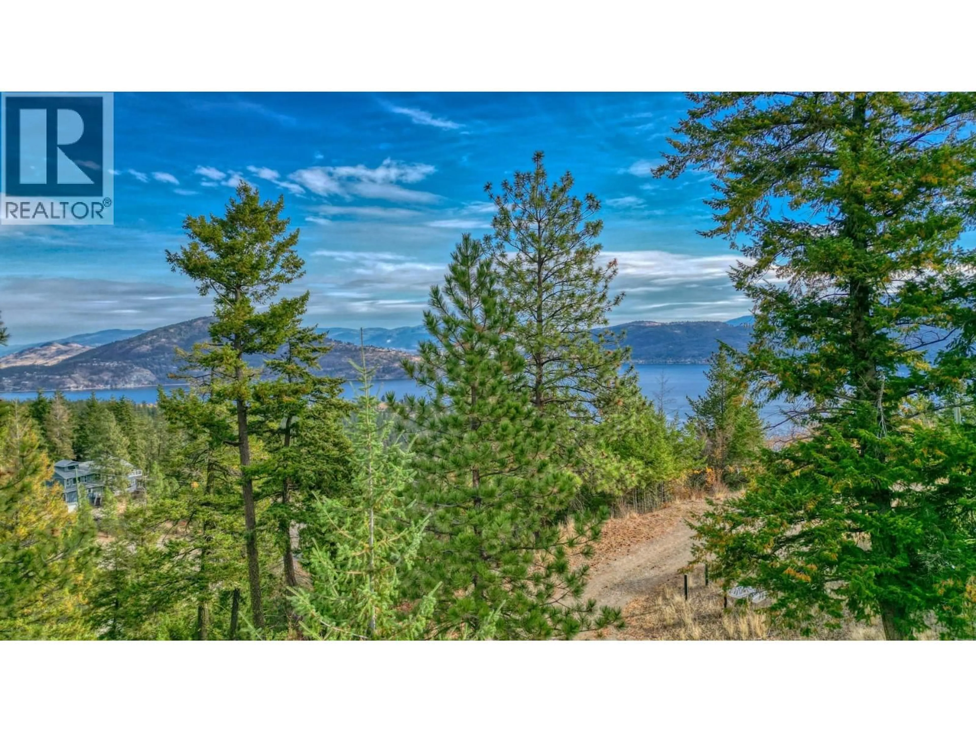 A pic from outside/outdoor area/front of a property/back of a property/a pic from drone, water/lake/river/ocean view for 348 LAKEWOOD ROAD, Vernon British Columbia v1H2B9