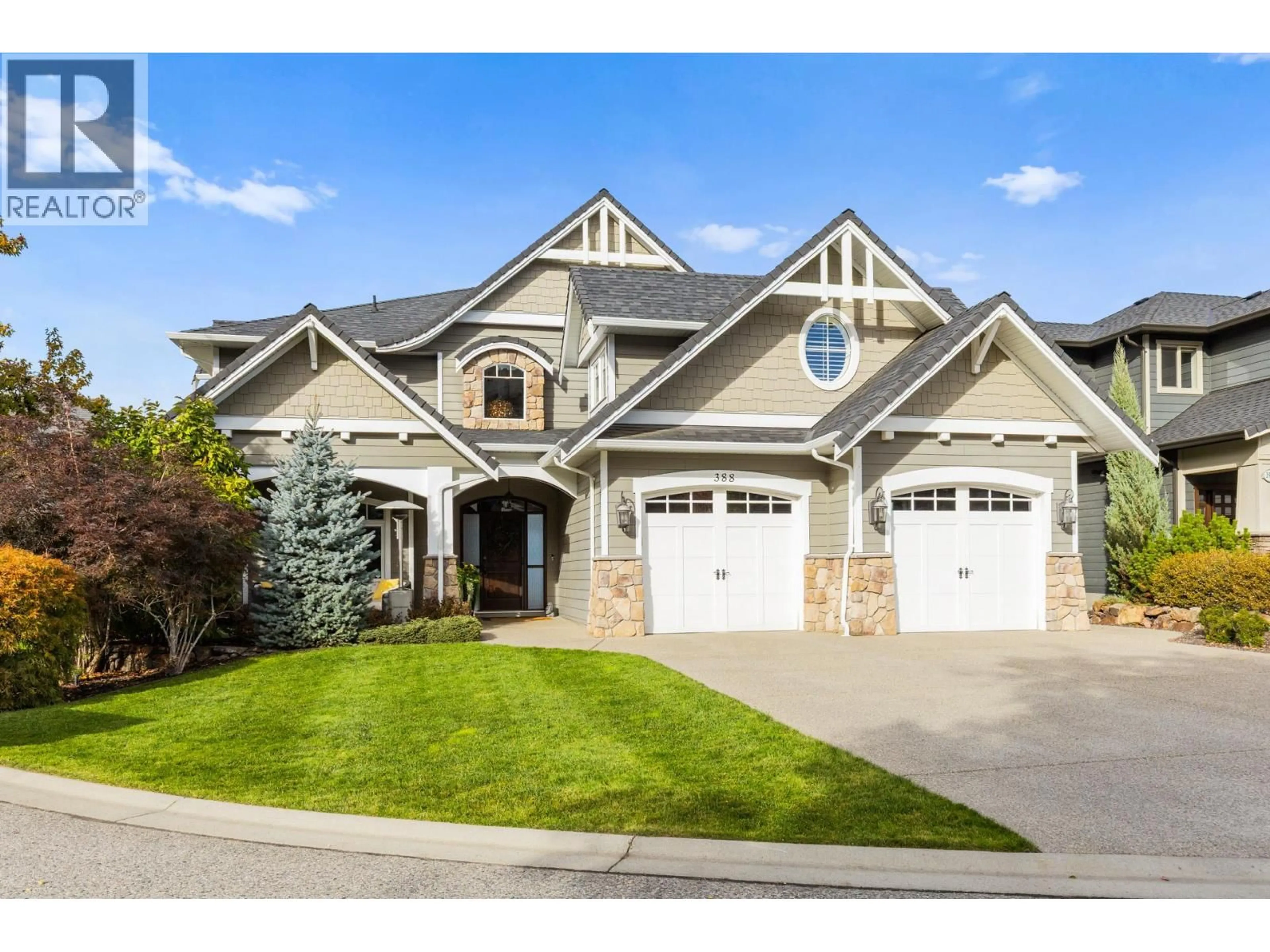 Home with vinyl exterior material, street for 388 RINDLE COURT, Kelowna British Columbia V1W5G5