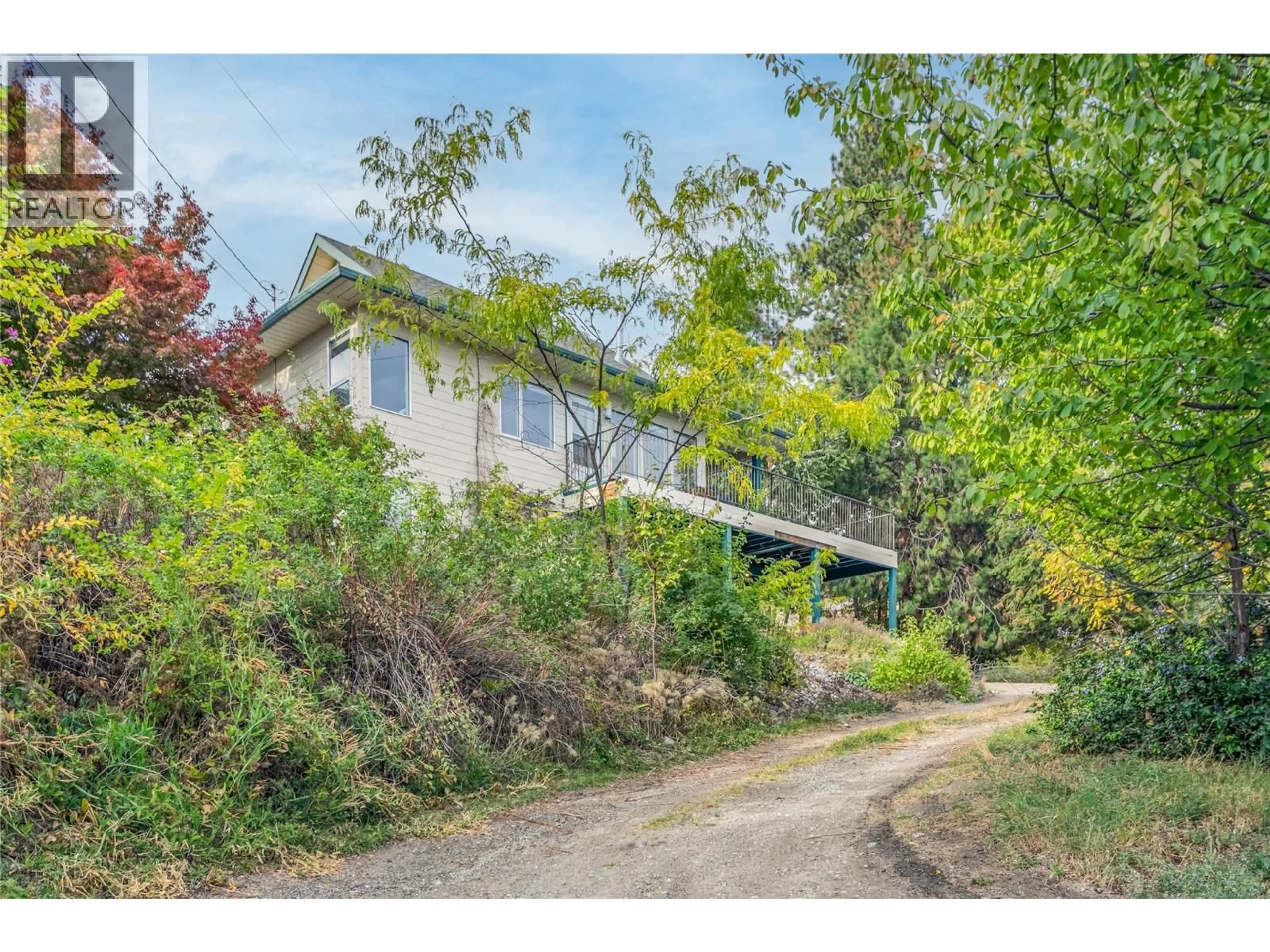 A pic from outside/outdoor area/front of a property/back of a property/a pic from drone, street for 6336 RENFREW ROAD, Peachland British Columbia V0H1X7