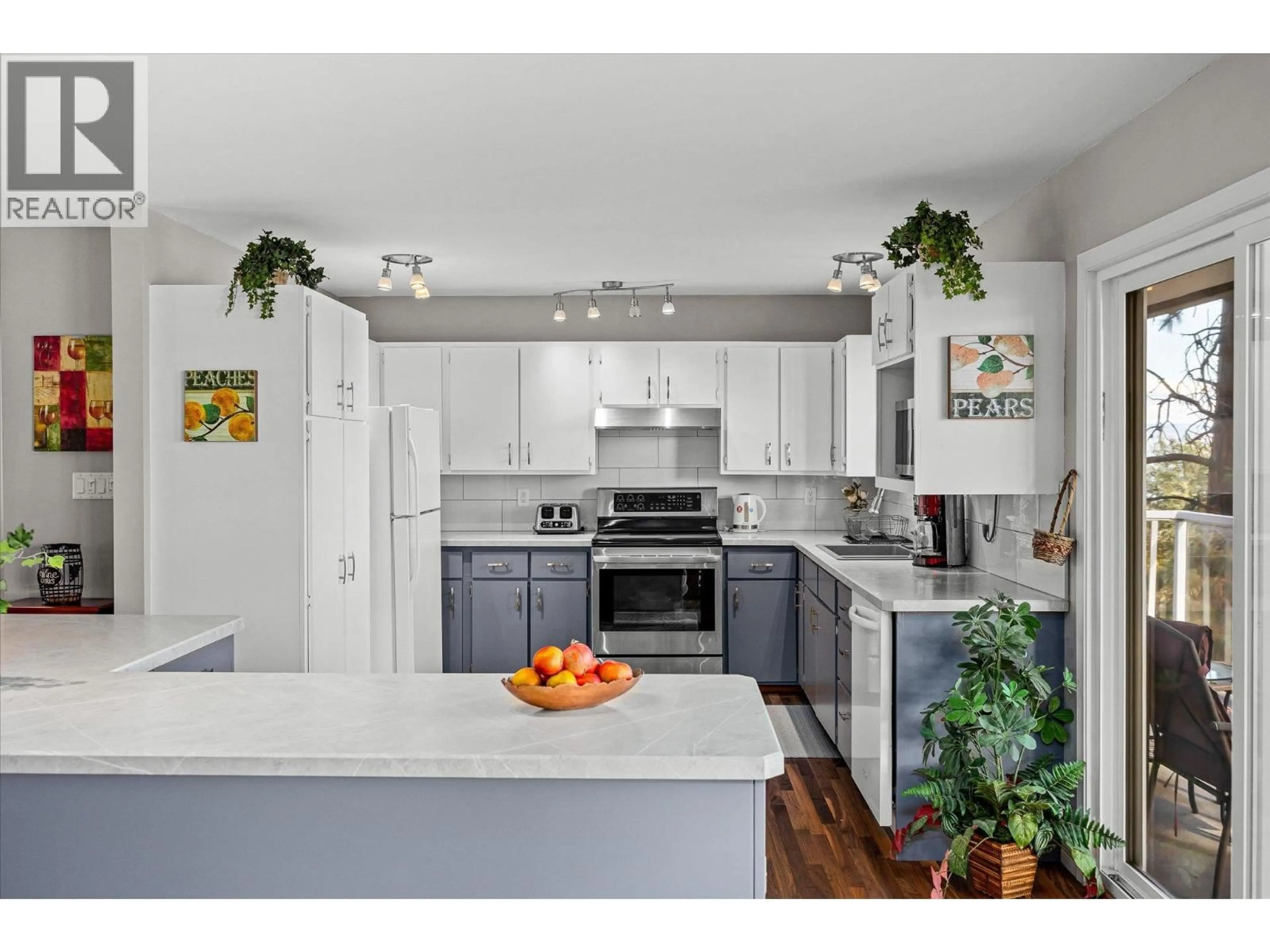 Open concept kitchen, unknown for 5821 ATKINSON CRESCENT, Peachland British Columbia V0H1X4