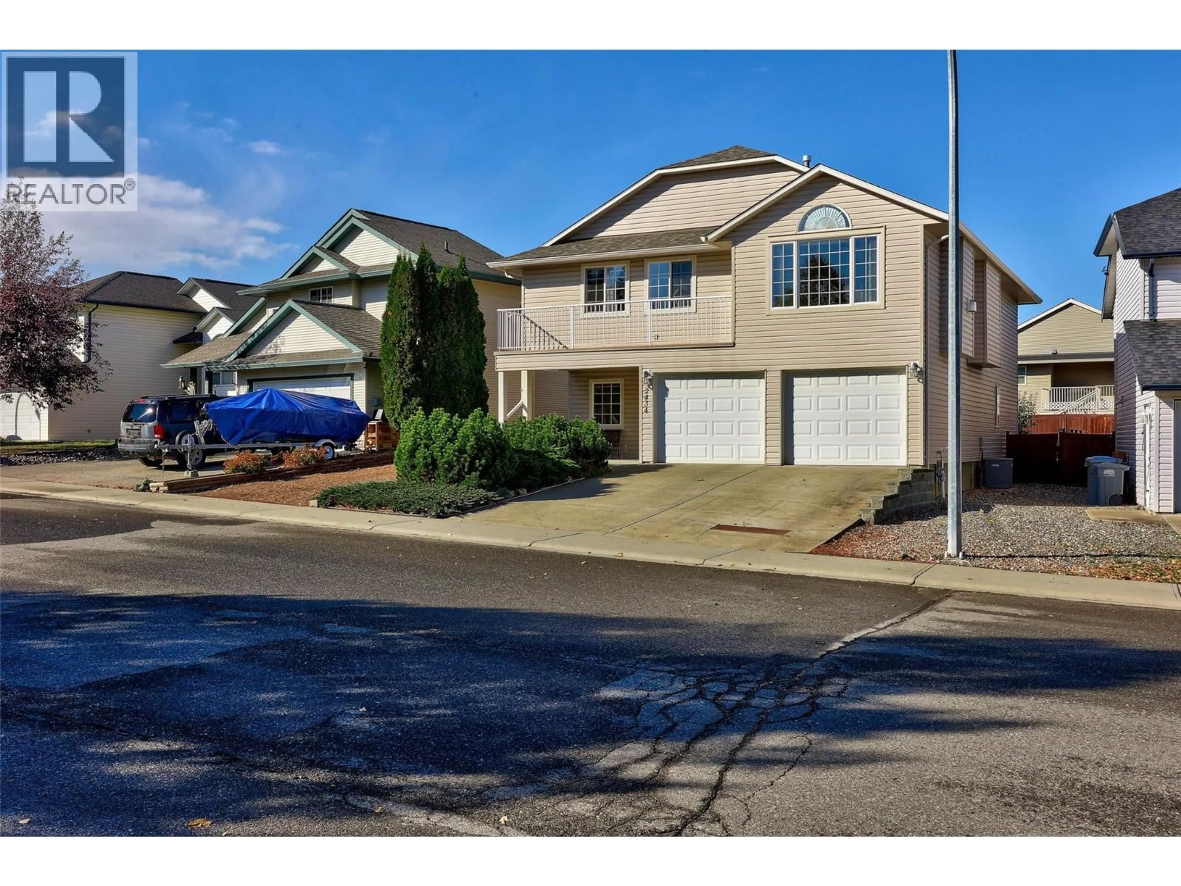 Home with vinyl exterior material, street for 2434 ABBEYGLEN WAY, Kamloops British Columbia V1S1Y7