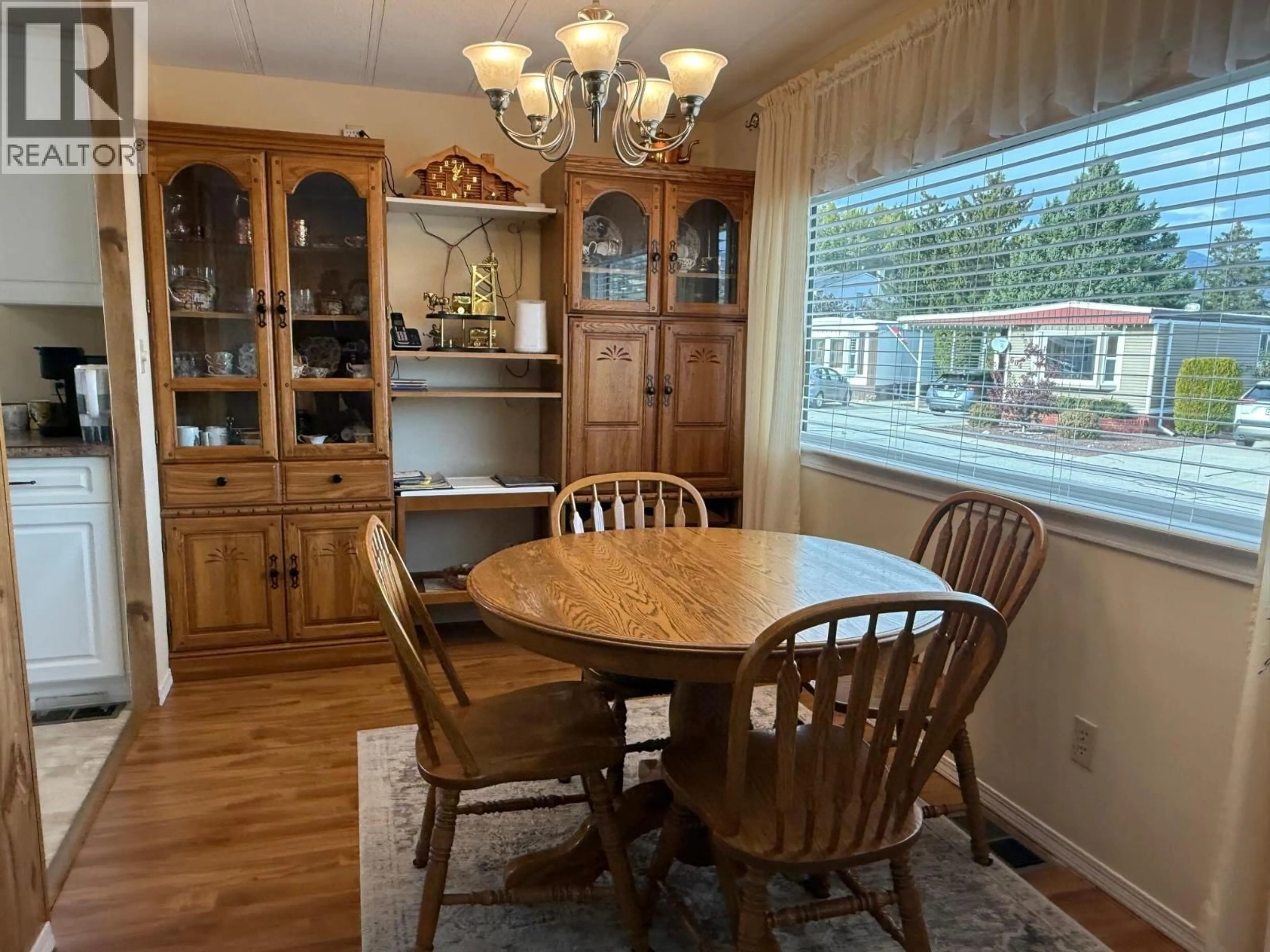 Dining room, wood/laminate floor for 615 - 3105 SOUTH MAIN STREET, Penticton British Columbia V2A7H1