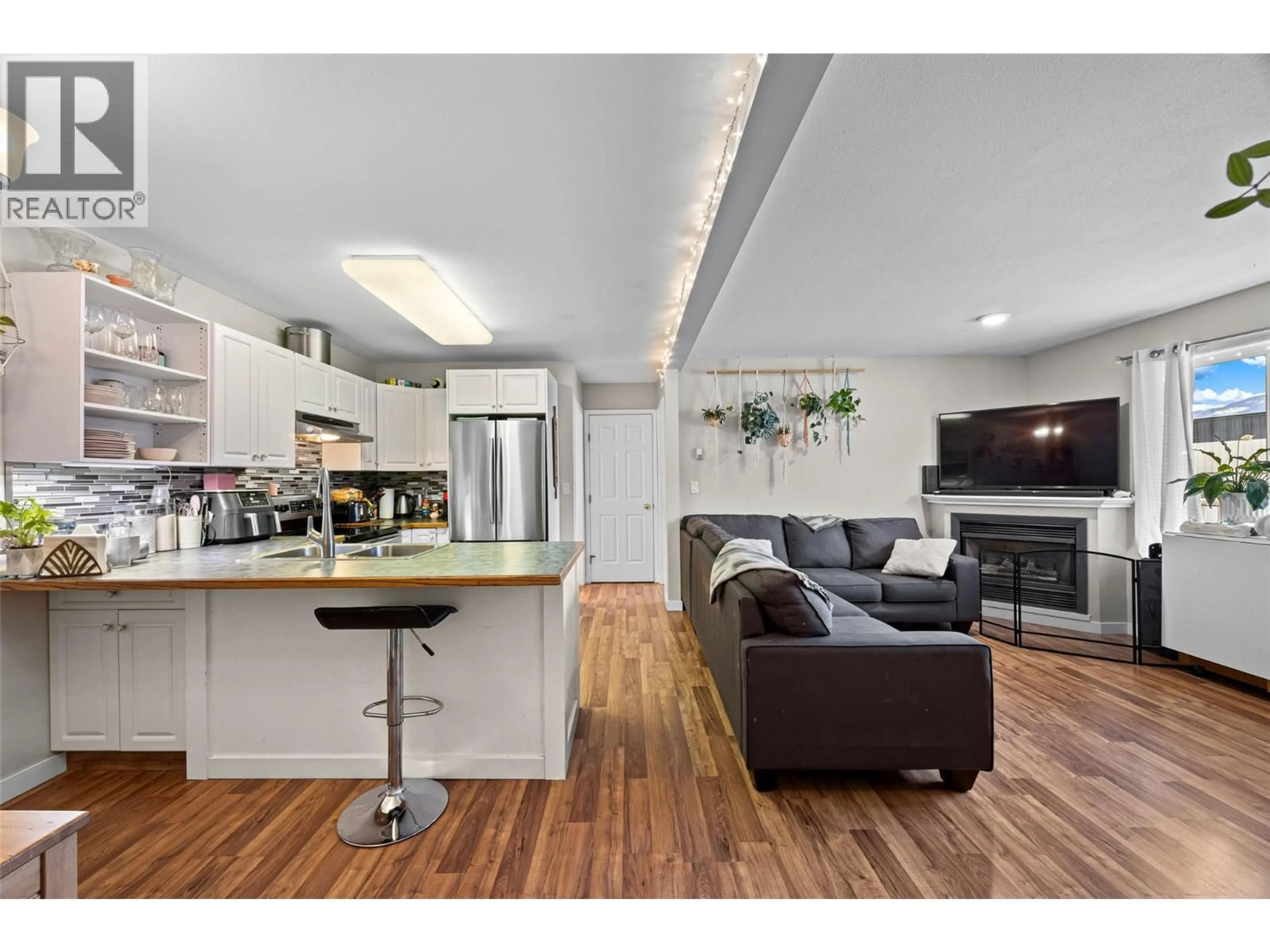 Open concept kitchen, wood/laminate floor for 203 - 380 SHEPHERD ROAD, Chase British Columbia V0E1M0