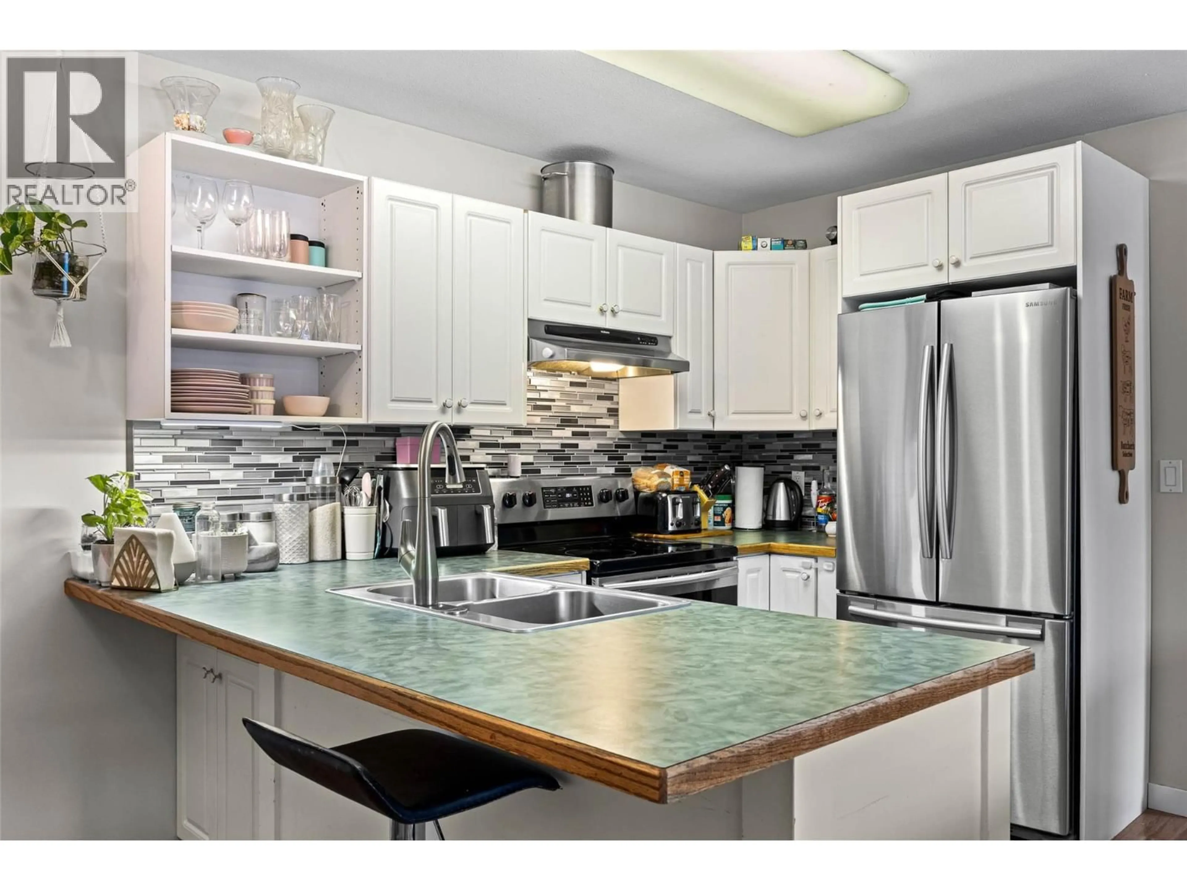 Open concept kitchen, ceramic/tile floor for 203 - 380 SHEPHERD ROAD, Chase British Columbia V0E1M0