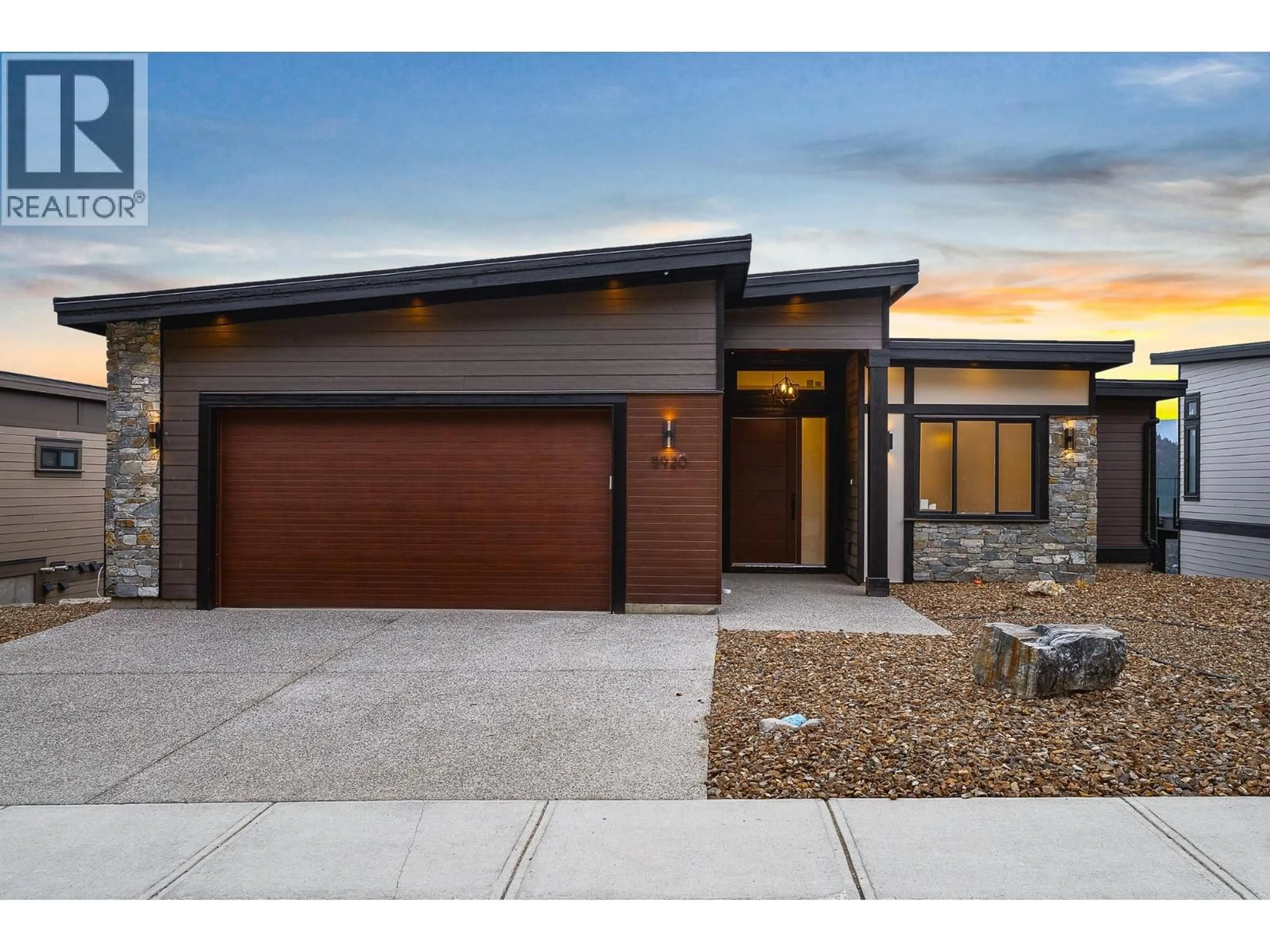 Home with brick exterior material, street for 8920 TAVISTOCK ROAD, Vernon British Columbia V1H2L4