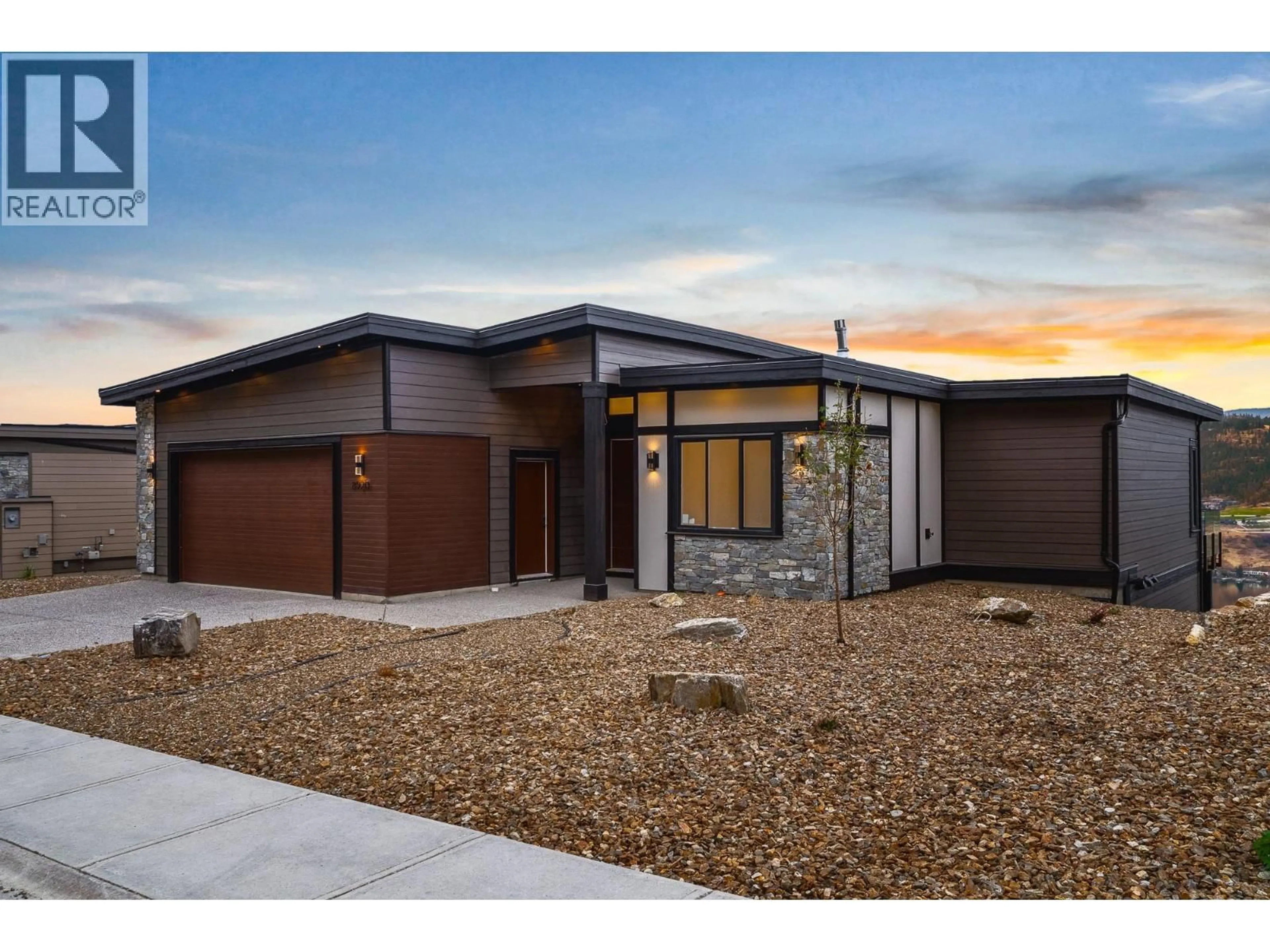 Home with brick exterior material, street for 8920 TAVISTOCK ROAD, Vernon British Columbia V1H2L4