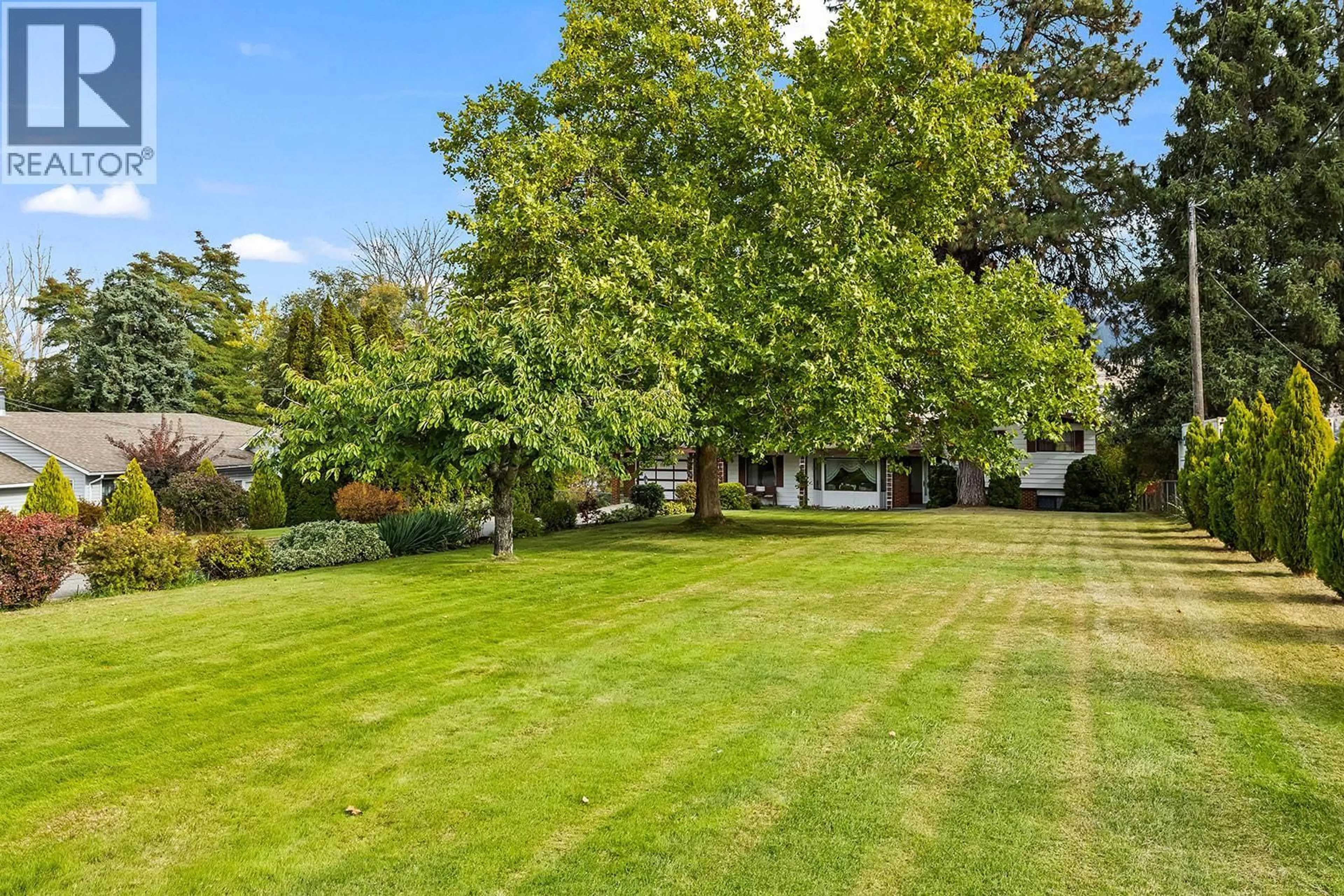 A pic from outside/outdoor area/front of a property/back of a property/a pic from drone, forest/trees view for 11291 OKANAGAN CENTRE ROAD EAST, Lake Country British Columbia V4V1G7