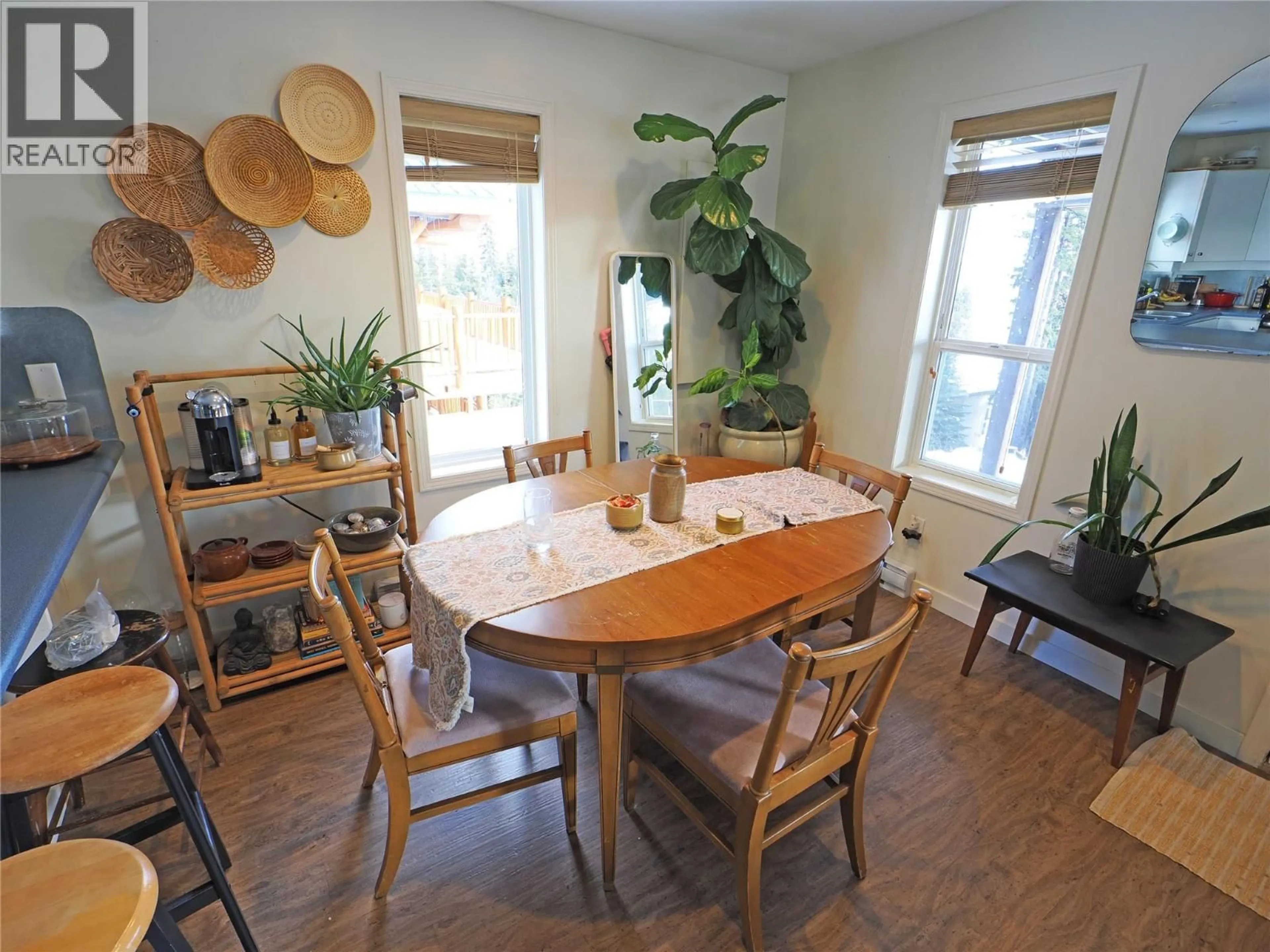 Dining room, wood/laminate floor for 4854 SNOWPINES ROAD, Big White British Columbia V1P1T4