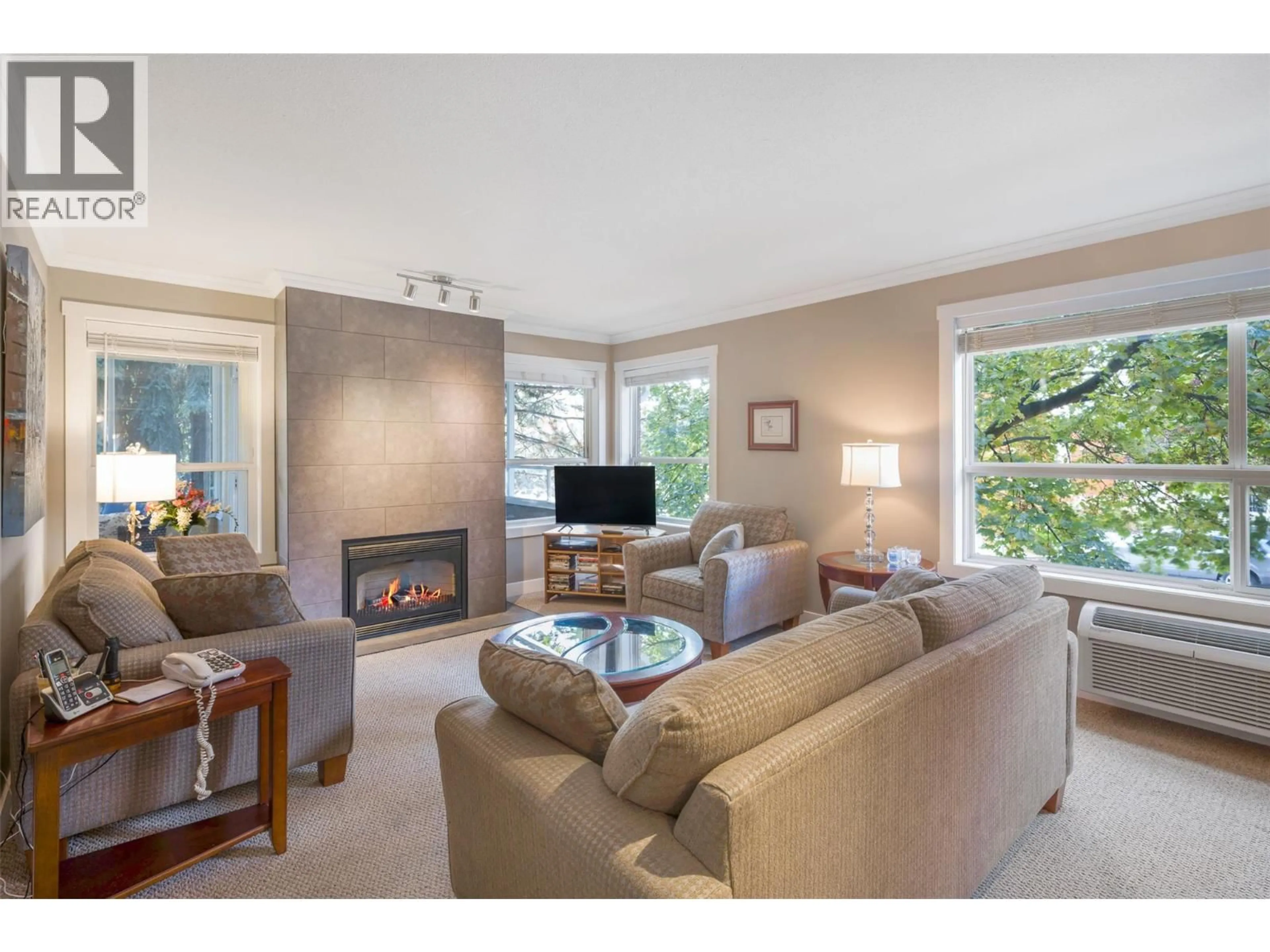 Living room with furniture, unknown for 106 - 933 HARVEY AVENUE, Kelowna British Columbia V1Y9S1