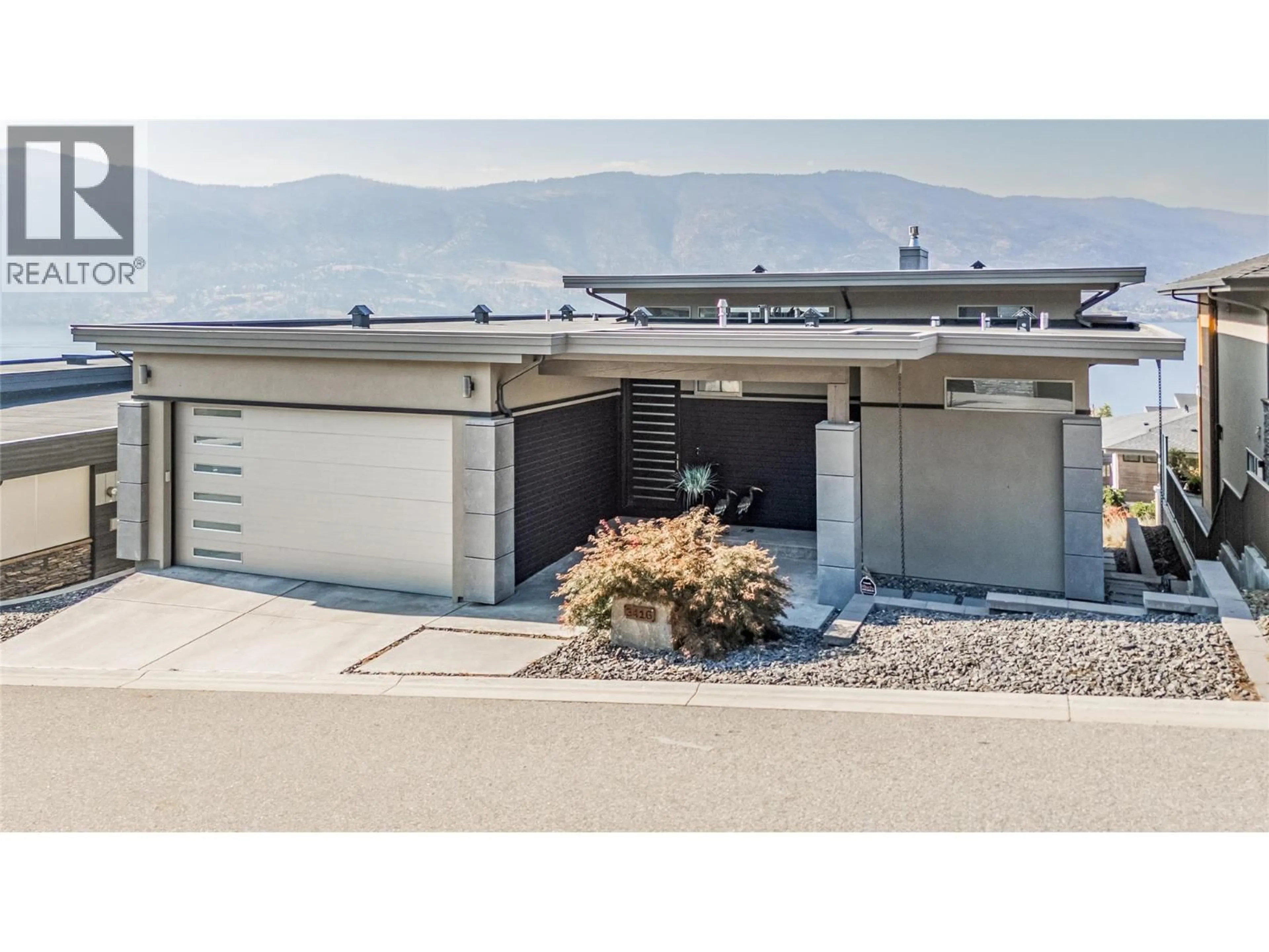 Home with vinyl exterior material, mountain view for 3416 WATER BIRCH CIRCLE, Kelowna British Columbia V1V3G1