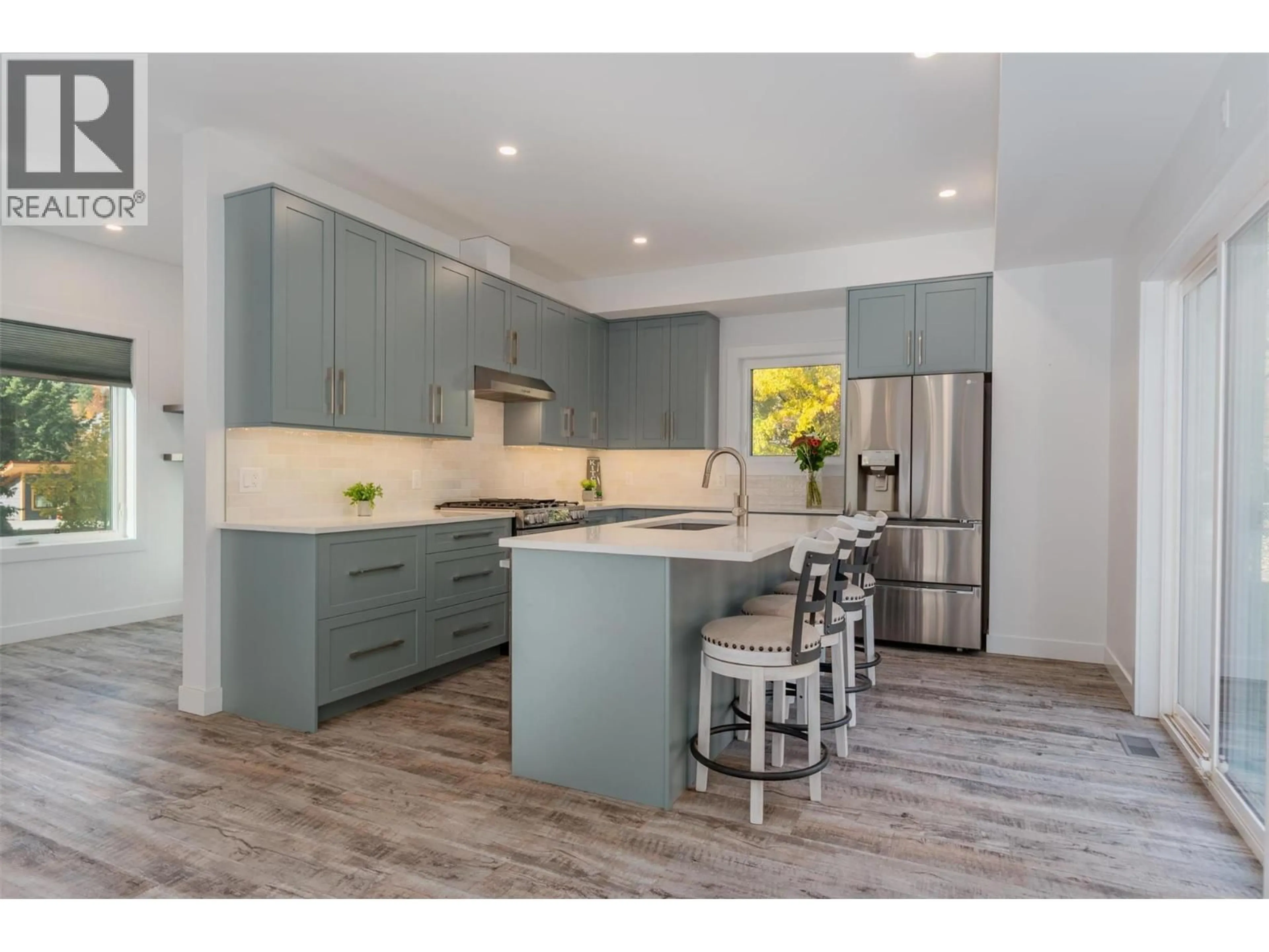 Open concept kitchen, wood/laminate floor for 2690 MONTE CHRISTO STREET, Rossland British Columbia V0G1Y0