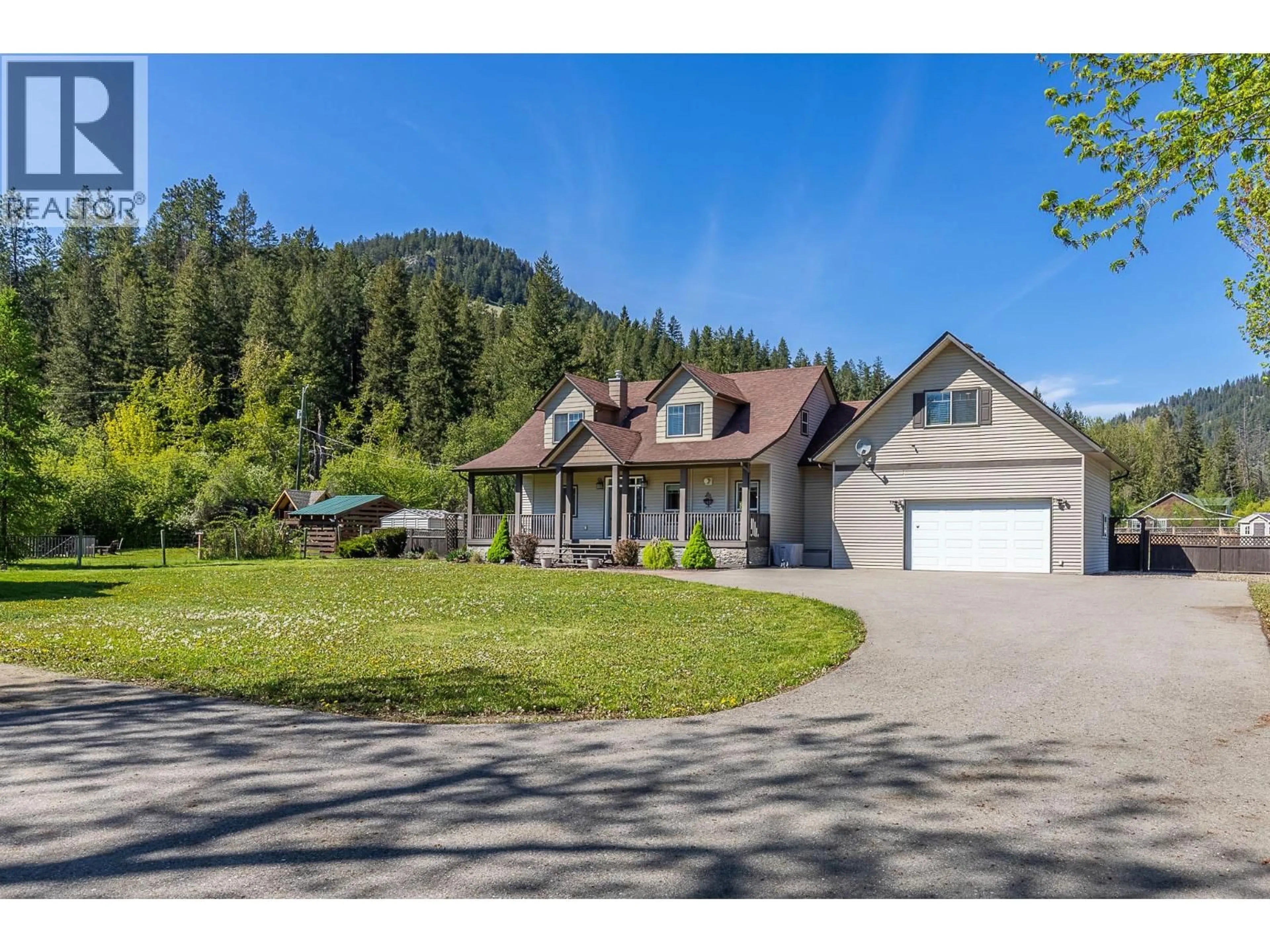 A pic from outside/outdoor area/front of a property/back of a property/a pic from drone, mountain view for 5575 HIGHWAY 6 HIGHWAY, Coldstream British Columbia V1T3E2