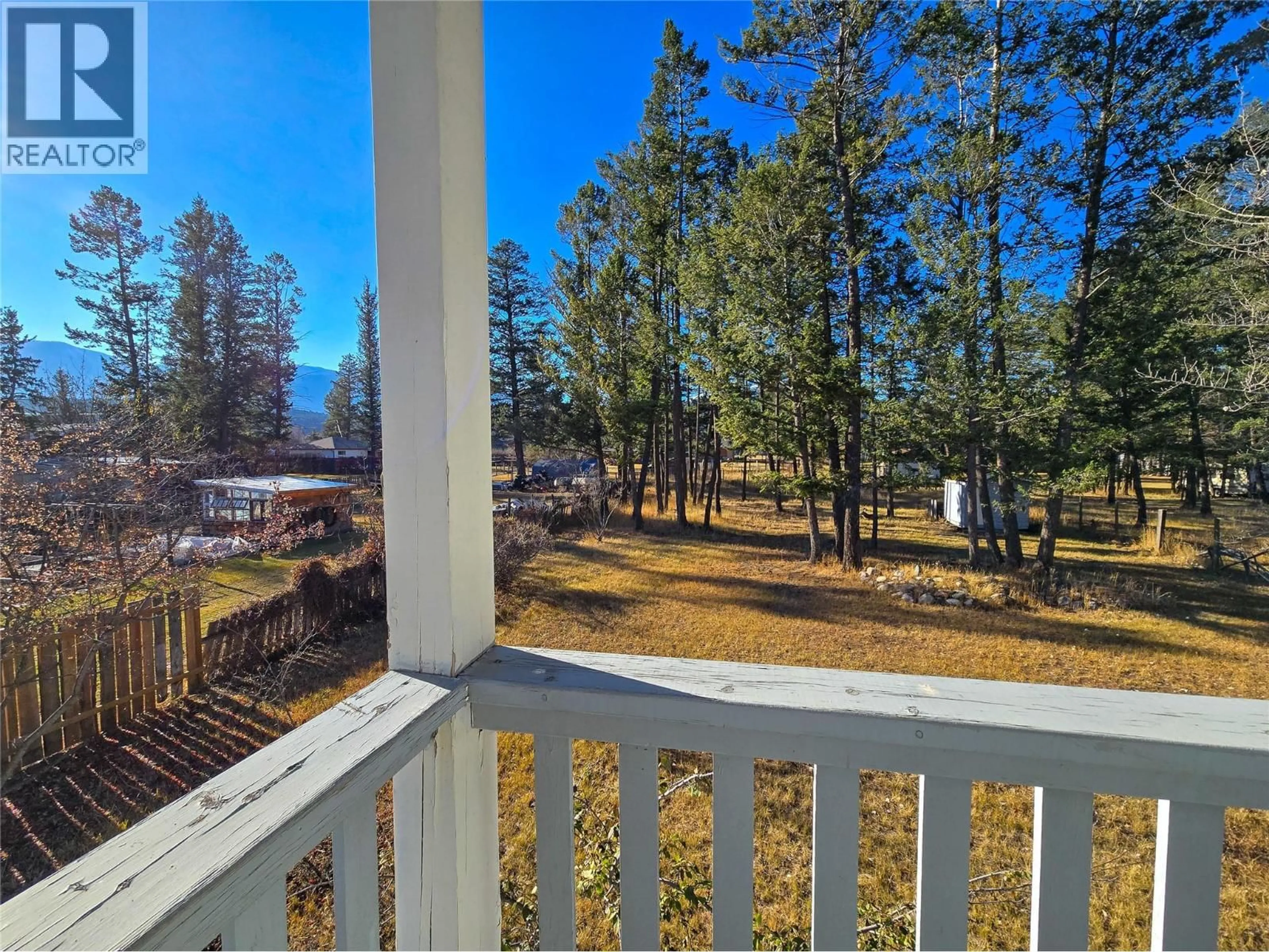 A pic from outside/outdoor area/front of a property/back of a property/a pic from drone, forest/trees view for 402 12TH AVENUE, Invermere British Columbia V0A1K0