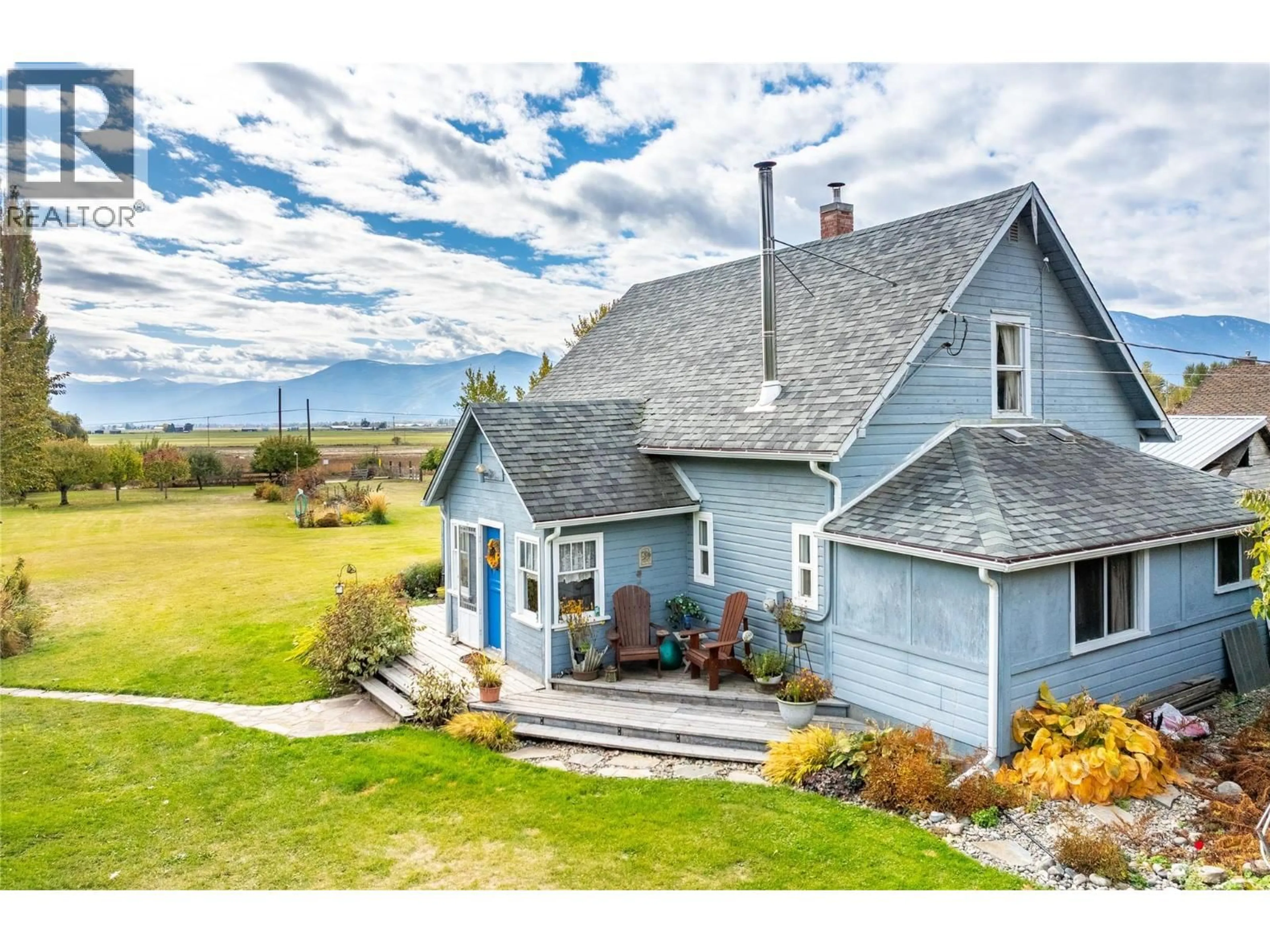 A pic from outside/outdoor area/front of a property/back of a property/a pic from drone, mountain view for 1015 WINLAW ROAD, Creston British Columbia V0B2N1