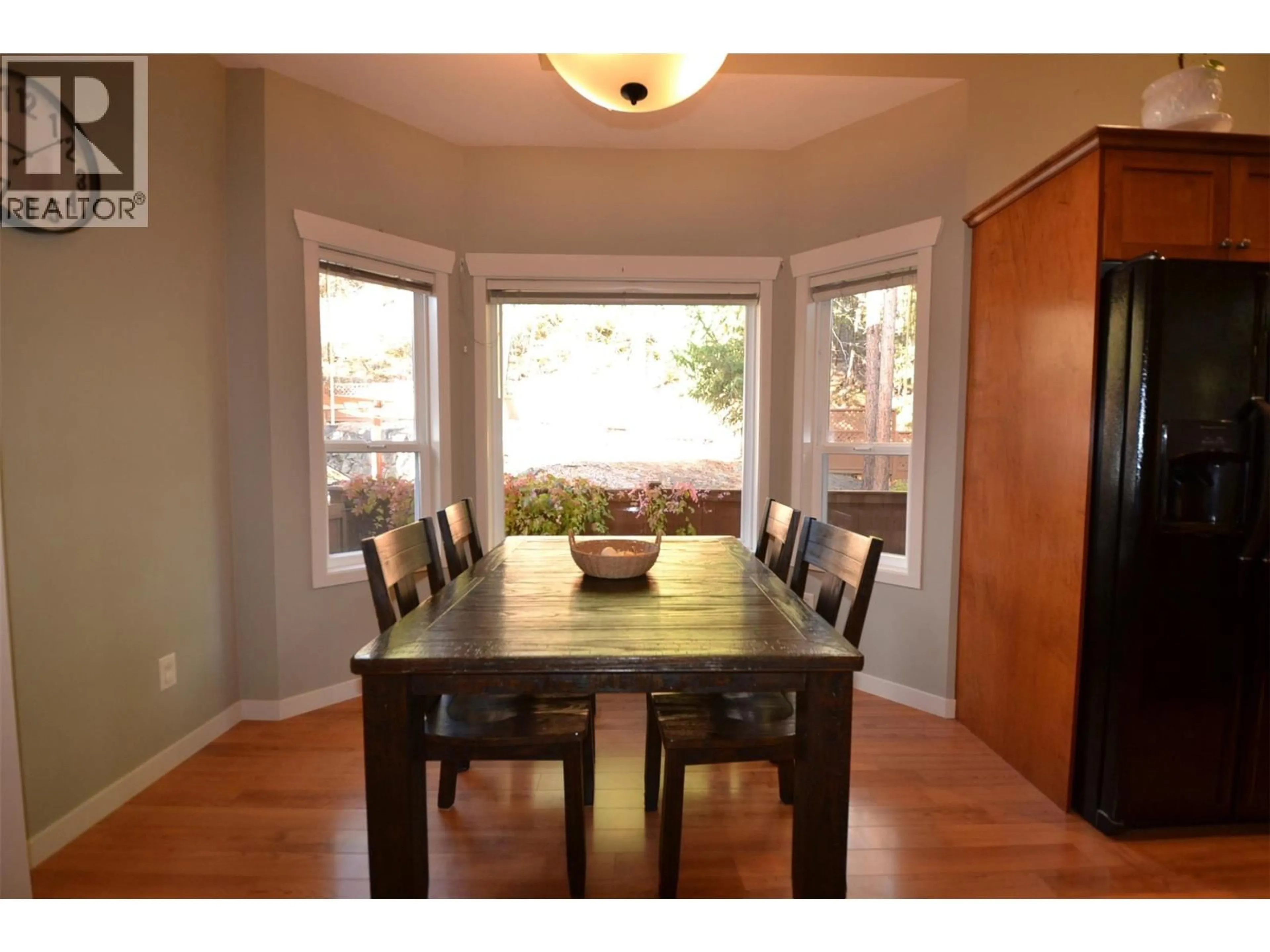 Dining room, wood/laminate floor for 10 - 1450 ROSE MEADOW DRIVE, West Kelowna British Columbia V1Z4A4