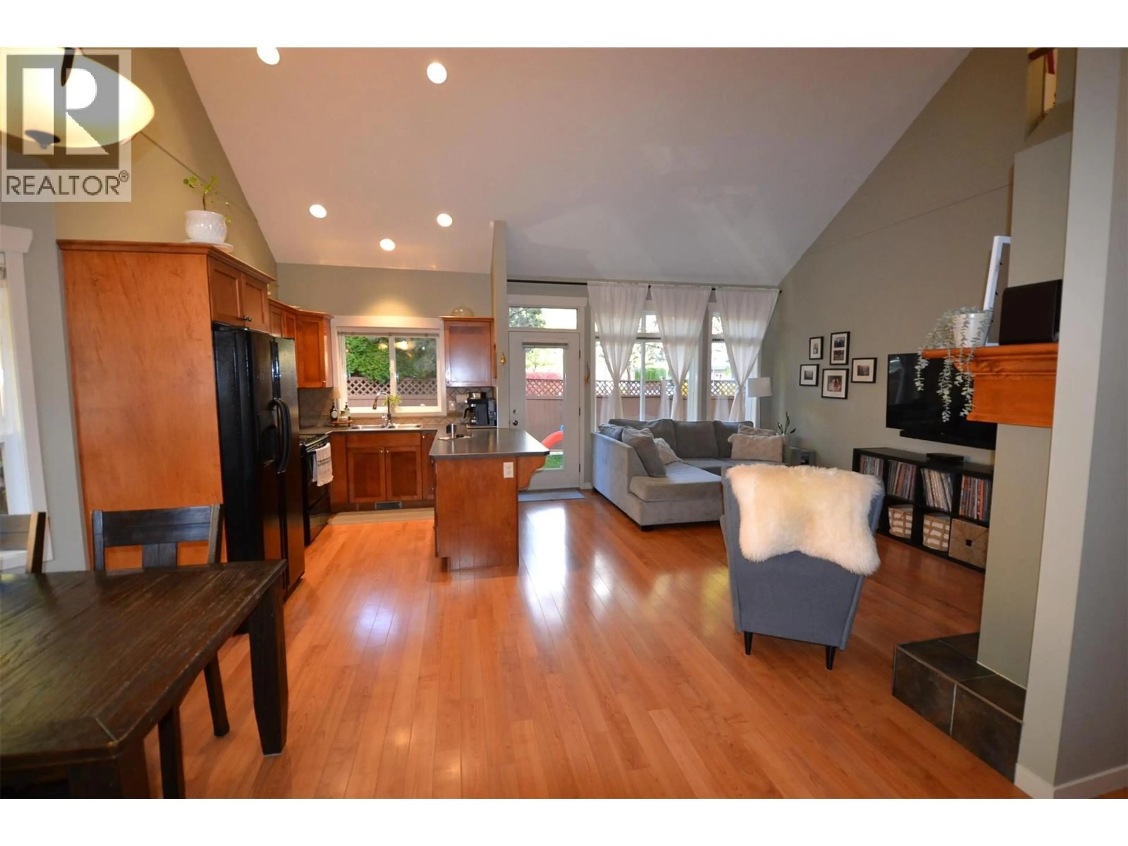 Open concept kitchen, wood/laminate floor for 10 - 1450 ROSE MEADOW DRIVE, West Kelowna British Columbia V1Z4A4