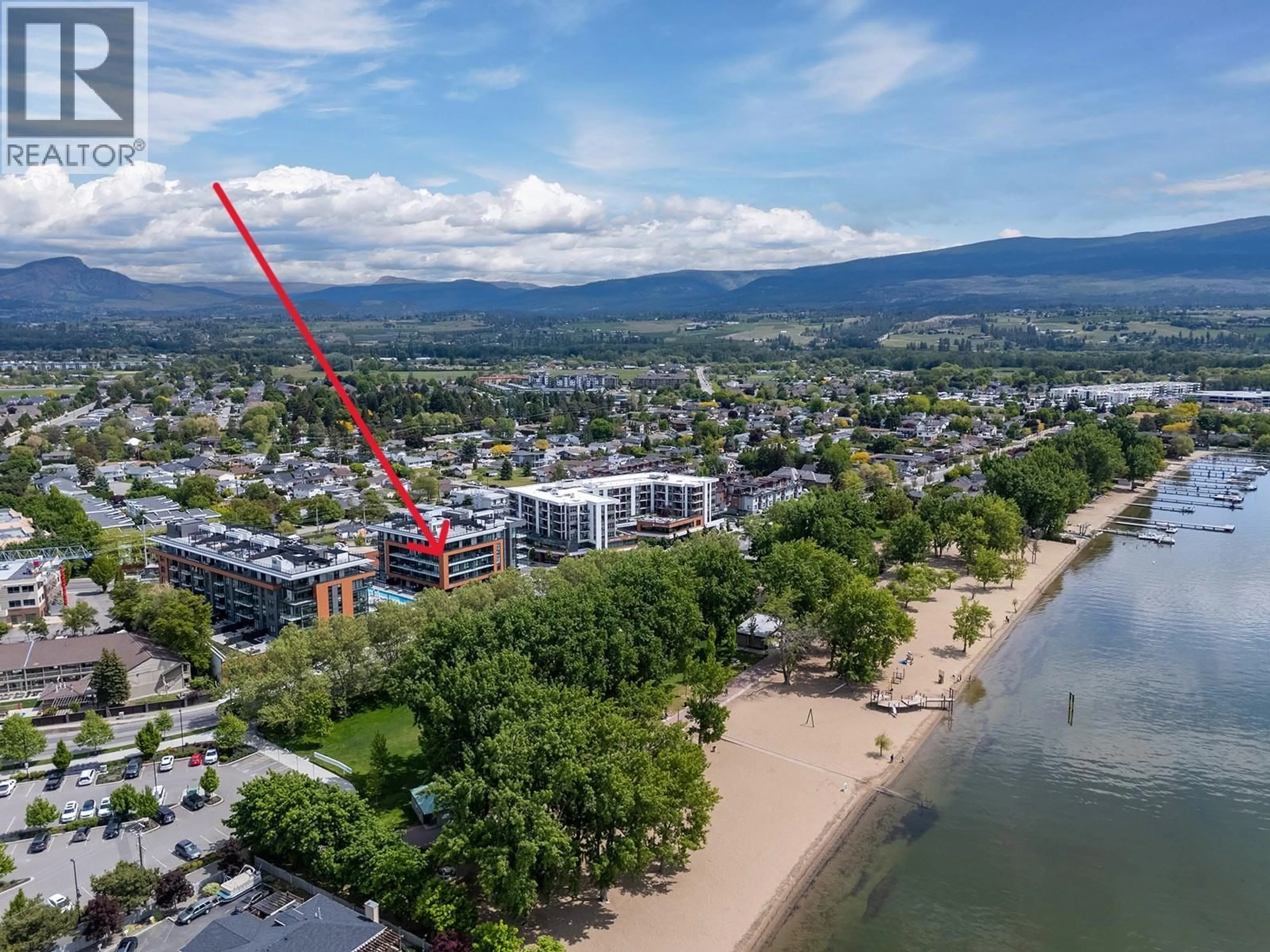A pic from outside/outdoor area/front of a property/back of a property/a pic from drone, water/lake/river/ocean view for 509 - 3409 LAKESHORE ROAD, Kelowna British Columbia V1W3S9