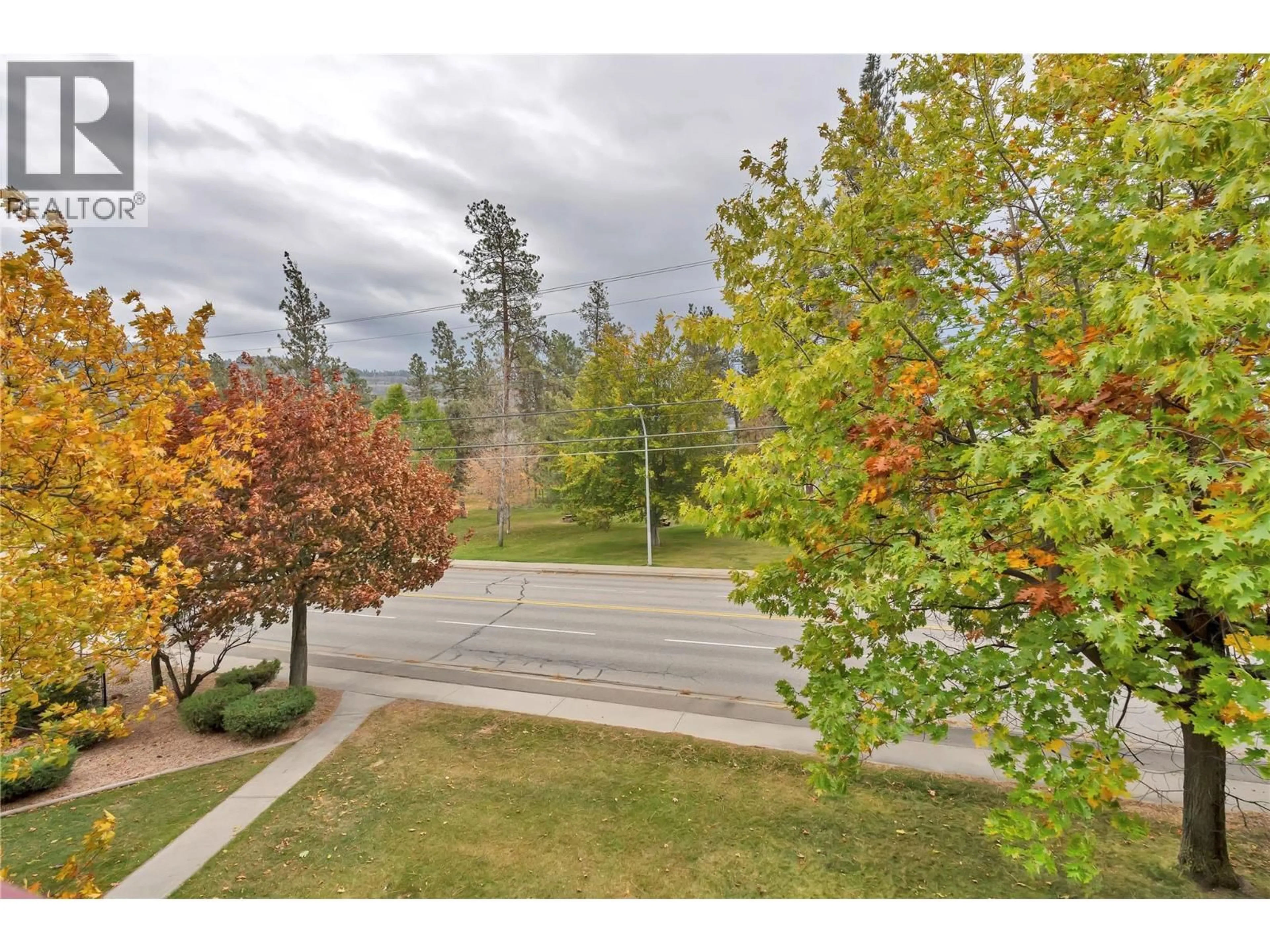 Patio, forest/trees view for 310 - 110 SKAHA PLACE, Penticton British Columbia V2A7L1