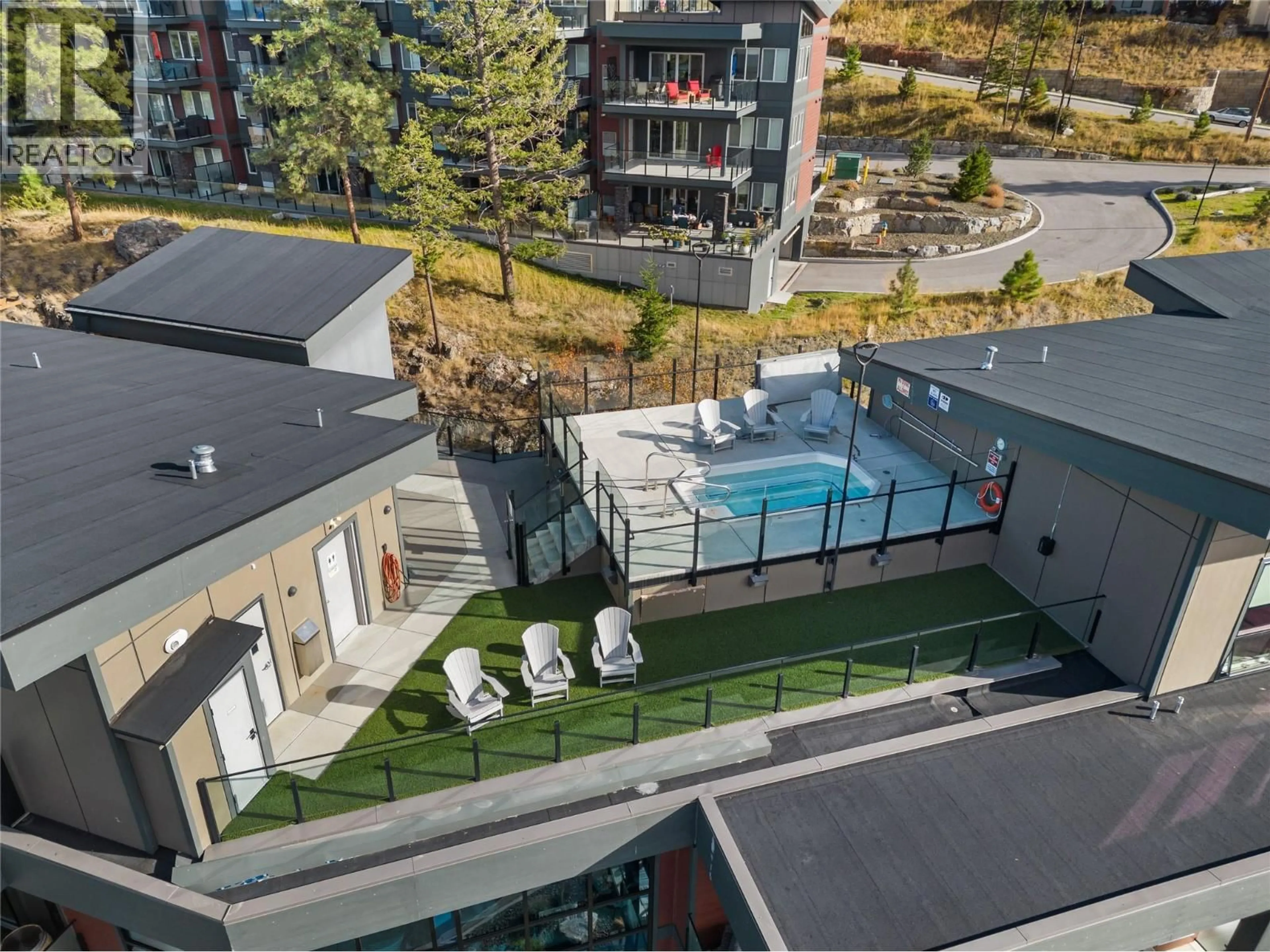 A pic from outside/outdoor area/front of a property/back of a property/a pic from drone, mountain view for 104 - 3475 GRANITE CLOSE, Kelowna British Columbia V1V0B9