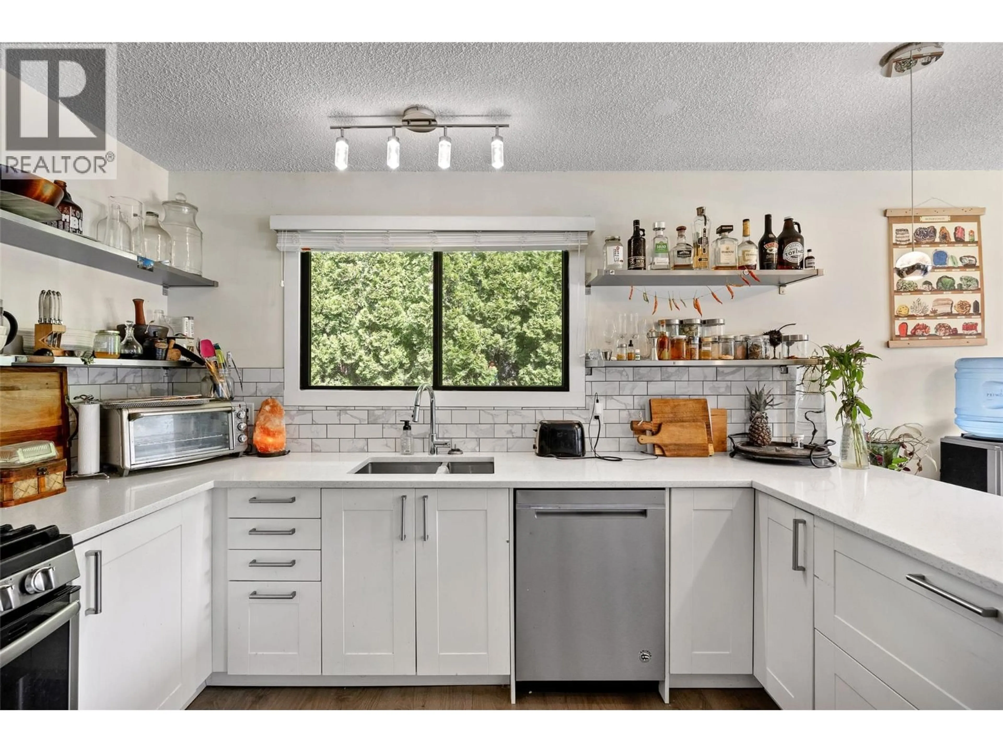 Contemporary kitchen, ceramic/tile floor for 750 MCCLURE ROAD, Kelowna British Columbia V1W1M2