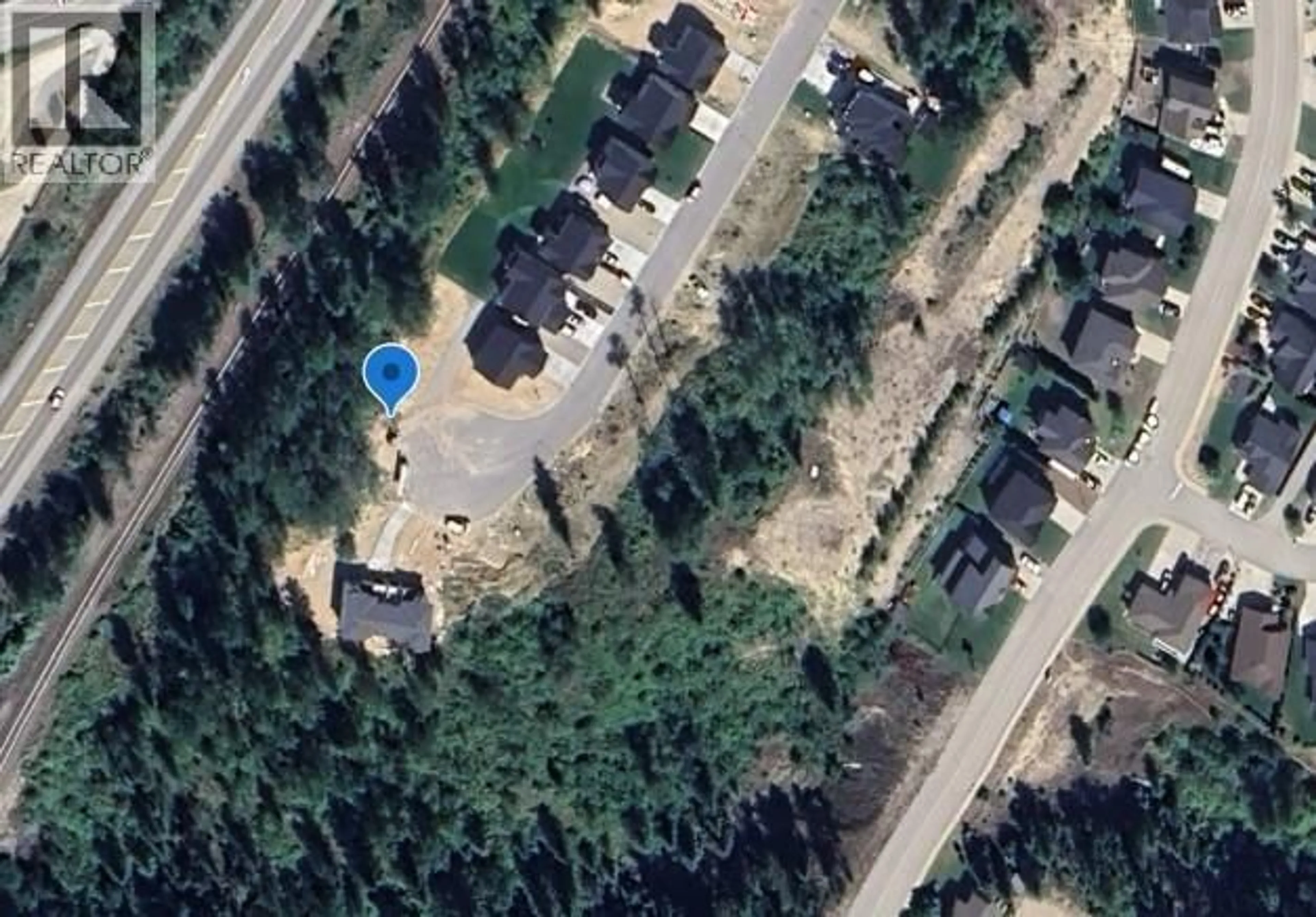 A pic from outside/outdoor area/front of a property/back of a property/a pic from drone, street for 1 - 3732 TOBA ROAD, Castlegar British Columbia V1N4Y3