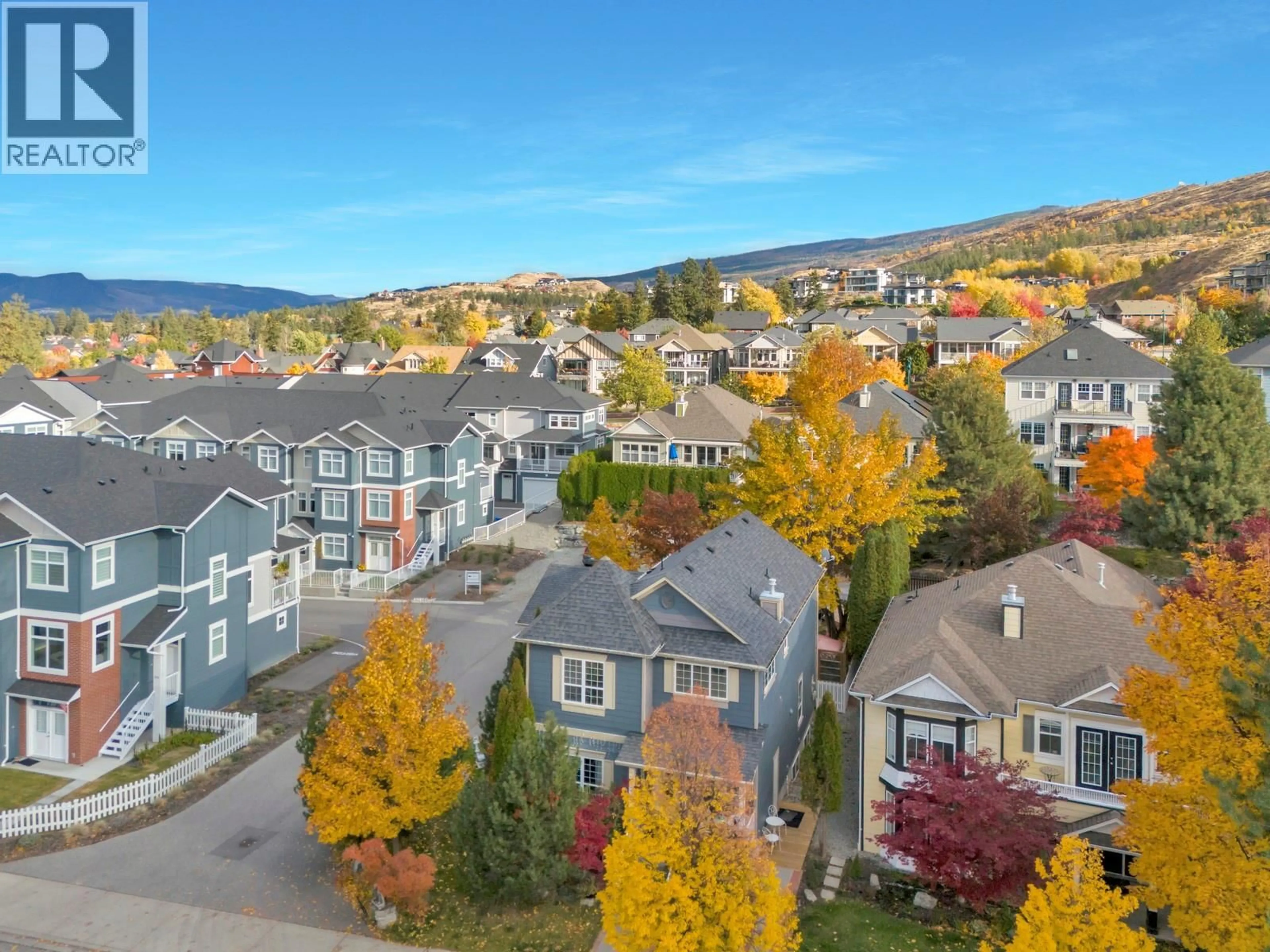 A pic from outside/outdoor area/front of a property/back of a property/a pic from drone, mountain view for 393 MCCARREN AVENUE, Kelowna British Columbia V1W4W3