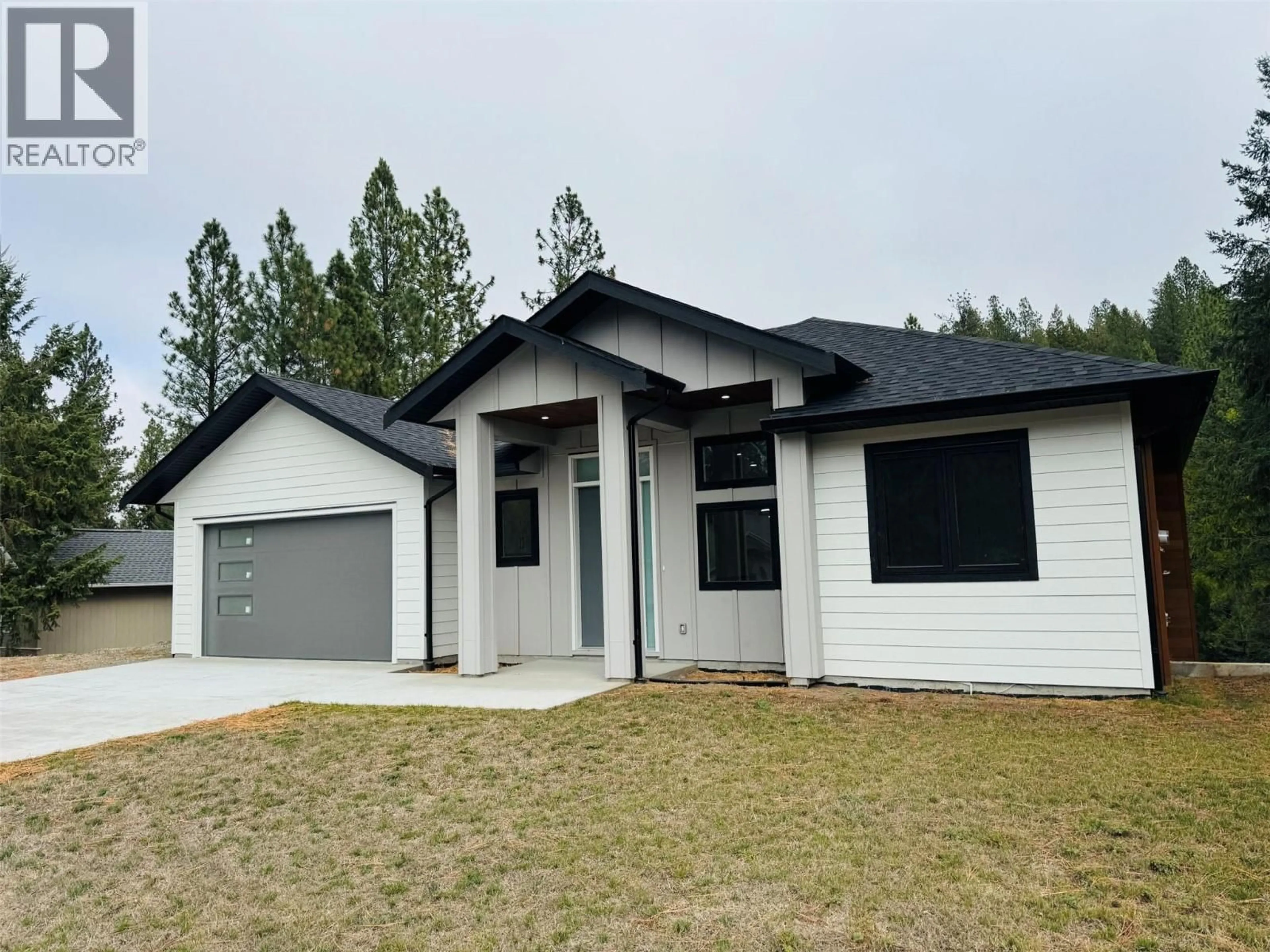 Home with vinyl exterior material, street for 245 PROSPECT DRIVE, Grand Forks British Columbia V0H1H2