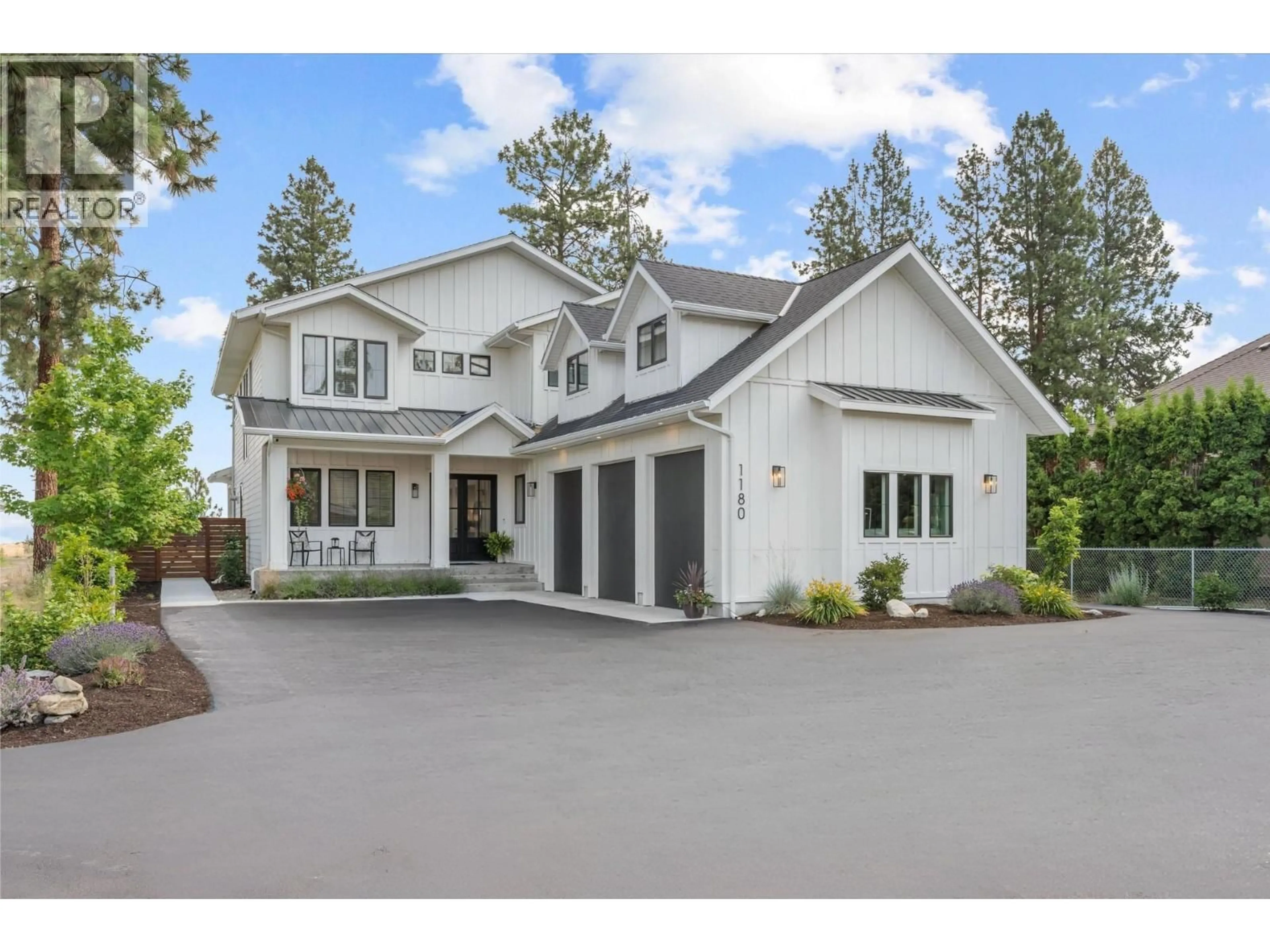 Home with vinyl exterior material, mountain view for 1180 MISSION RIDGE ROAD, Kelowna British Columbia V1W3B2