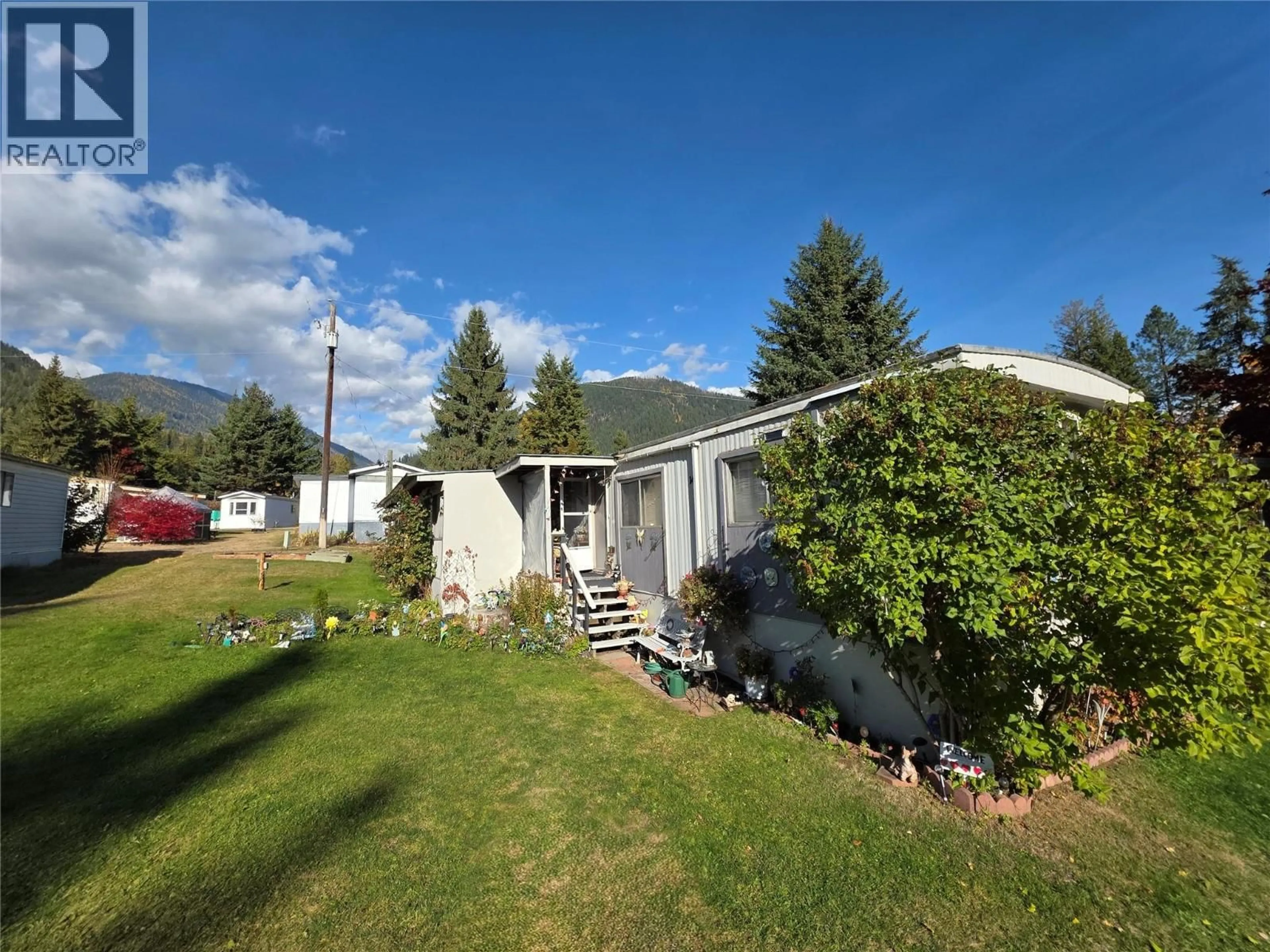 A pic from outside/outdoor area/front of a property/back of a property/a pic from drone, mountain view for 14 - 2756 GREENWOOD ROAD, Nelson British Columbia V1L6L2