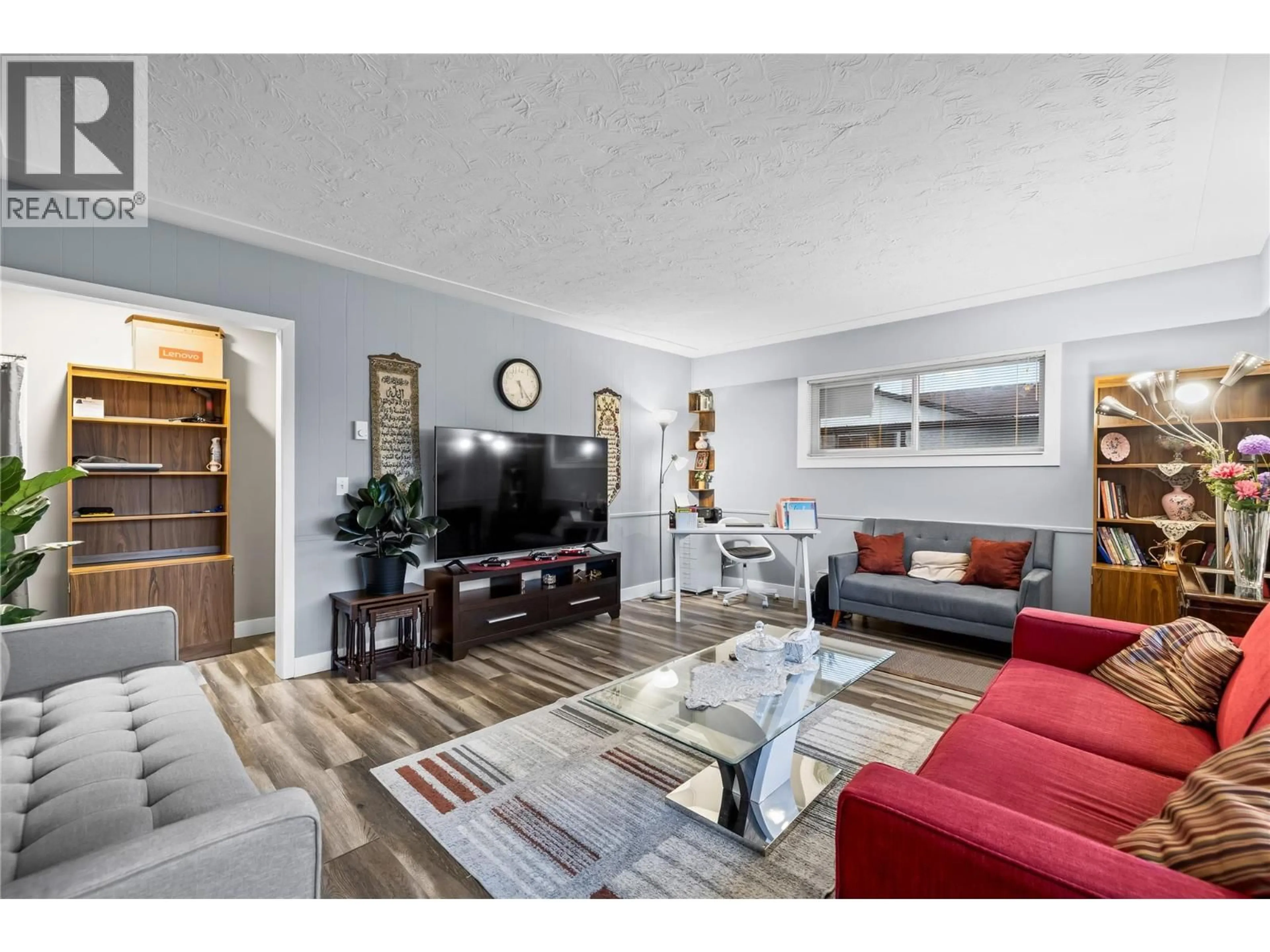 Living room with furniture, unknown for 205 HOMER ROAD, Kelowna British Columbia V1X3Z6