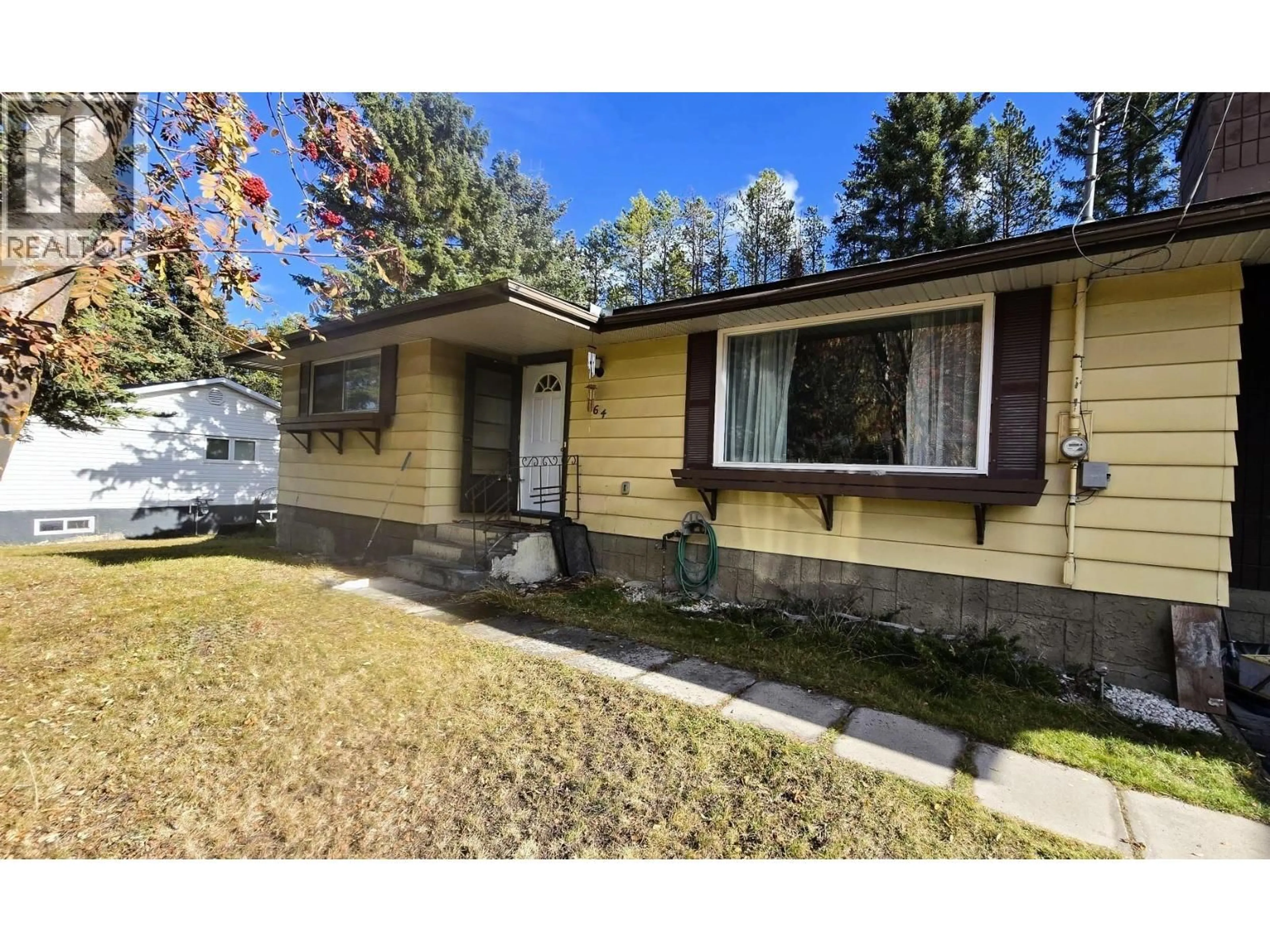 Home with vinyl exterior material, street for 764 FORDING DRIVE, Elkford British Columbia V0B1H0
