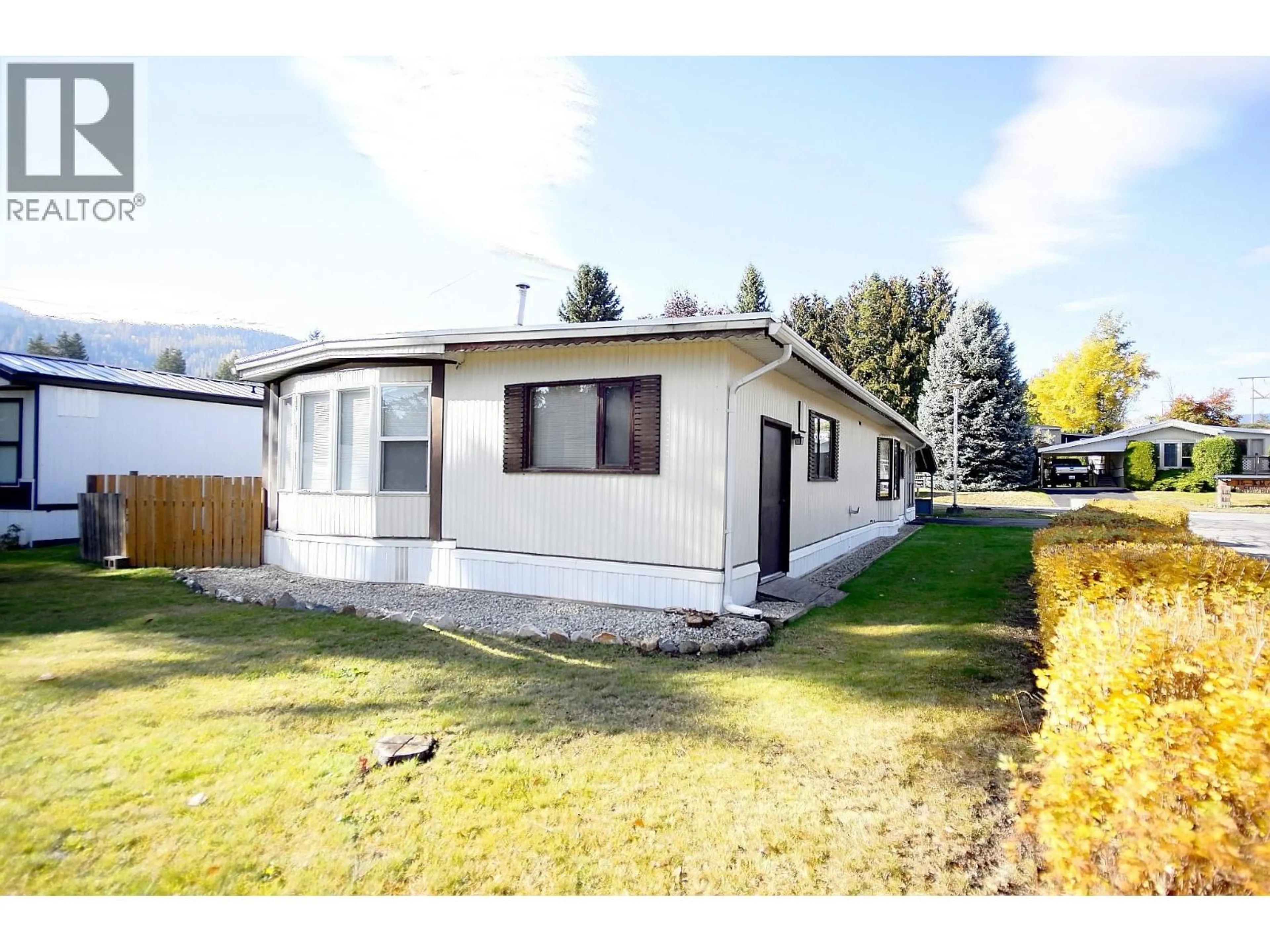 Home with vinyl exterior material, street for 1 - 1361 30 STREET SOUTHEAST, Salmon Arm British Columbia V1E2N4