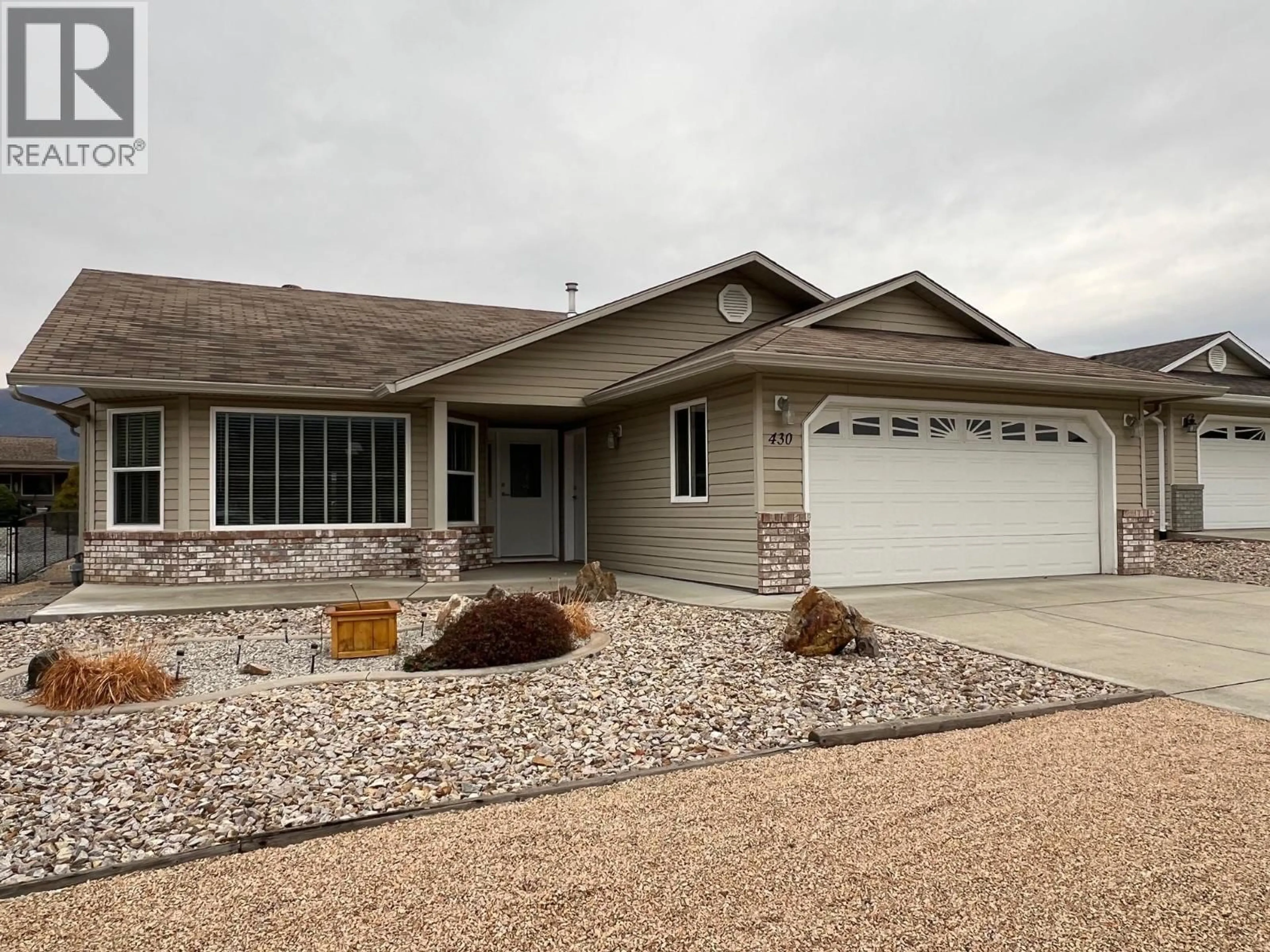 Home with vinyl exterior material, street for 430 4 STREET, Vernon British Columbia V1H1Z1