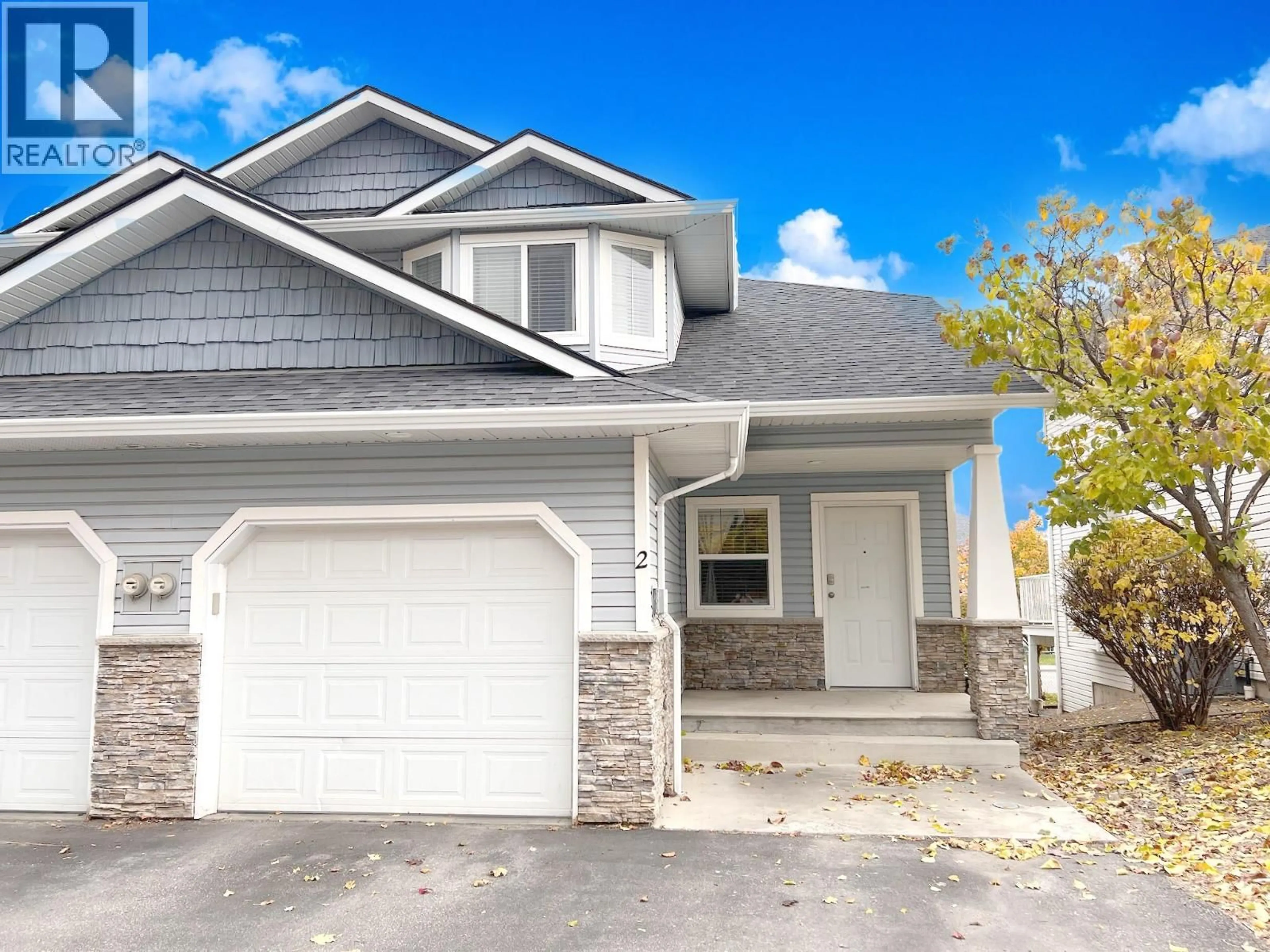 Home with vinyl exterior material, street for 2 - 1945 GRASSLANDS BOULEVARD, Kamloops British Columbia V2B8T3