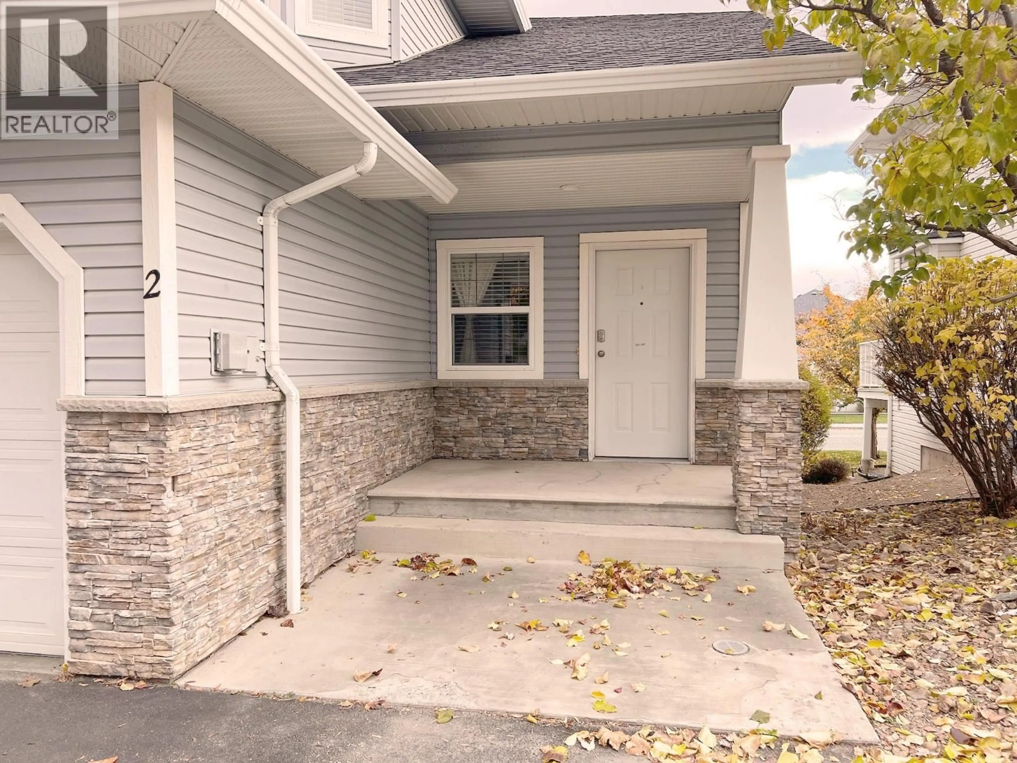 Home with vinyl exterior material, street for 2 - 1945 GRASSLANDS BOULEVARD, Kamloops British Columbia V2B8T3