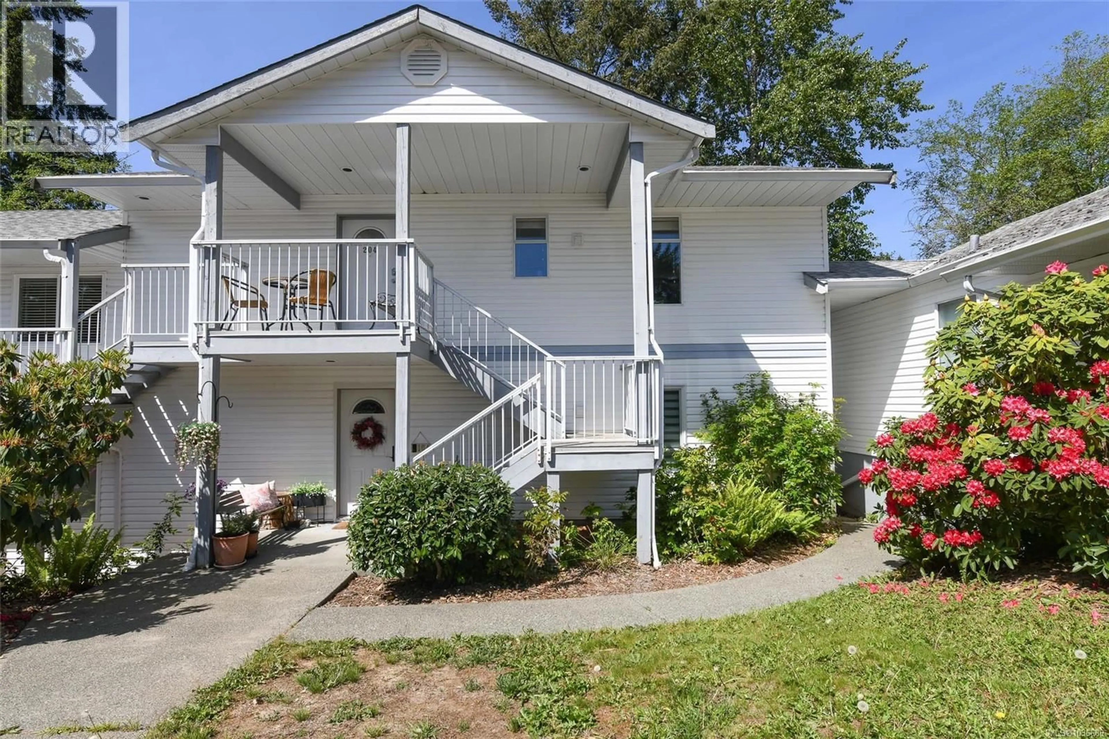 Home with vinyl exterior material, street for 204 - 220 BACK ROAD, Courtenay British Columbia V9N3W6