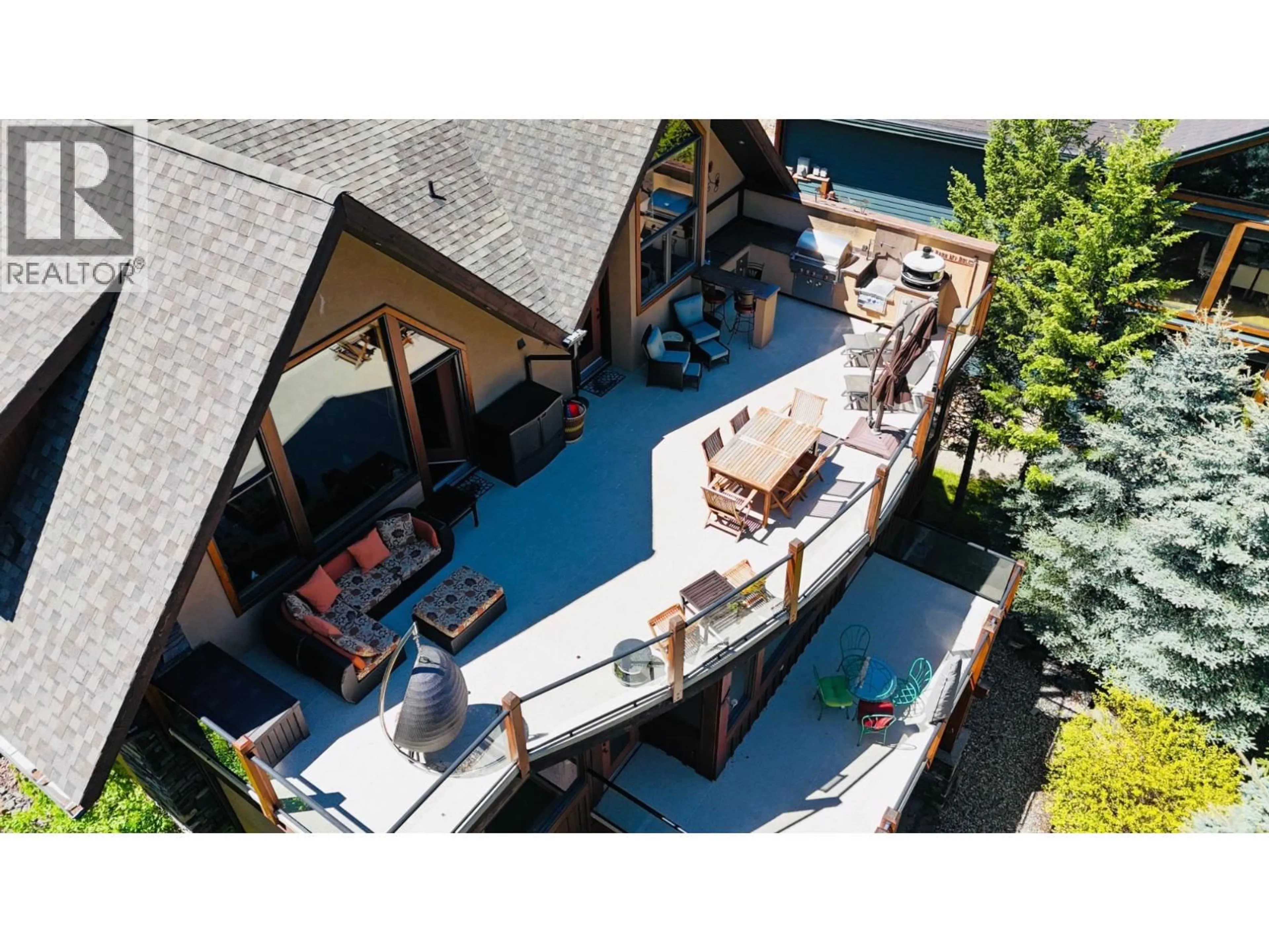 A pic from outside/outdoor area/front of a property/back of a property/a pic from drone, street for 2557 LEDGEROCK RIDGE, Invermere British Columbia V0A1K6