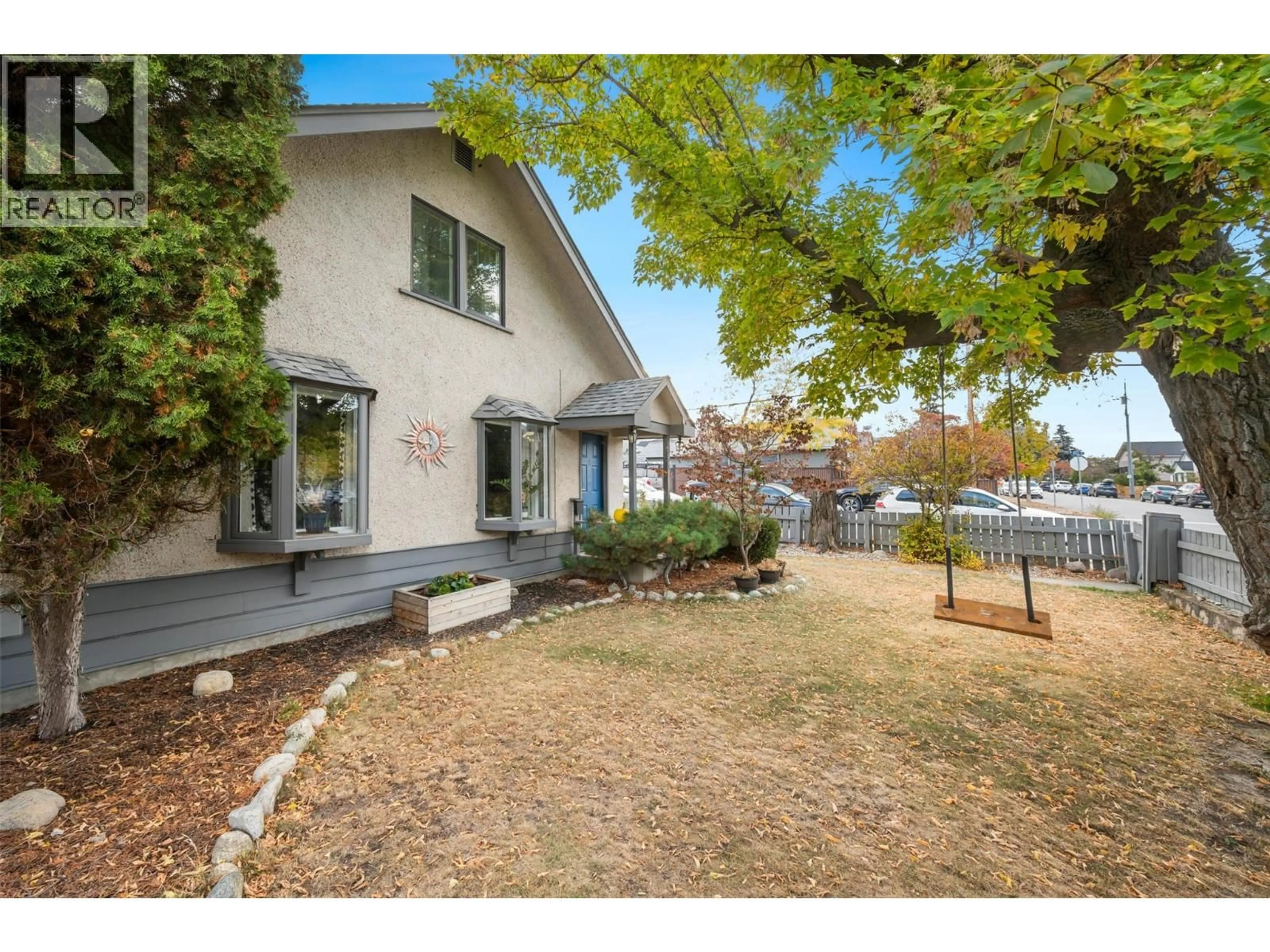A pic from outside/outdoor area/front of a property/back of a property/a pic from drone, street for 598 VAN HORNE STREET, Penticton British Columbia V2A4K8