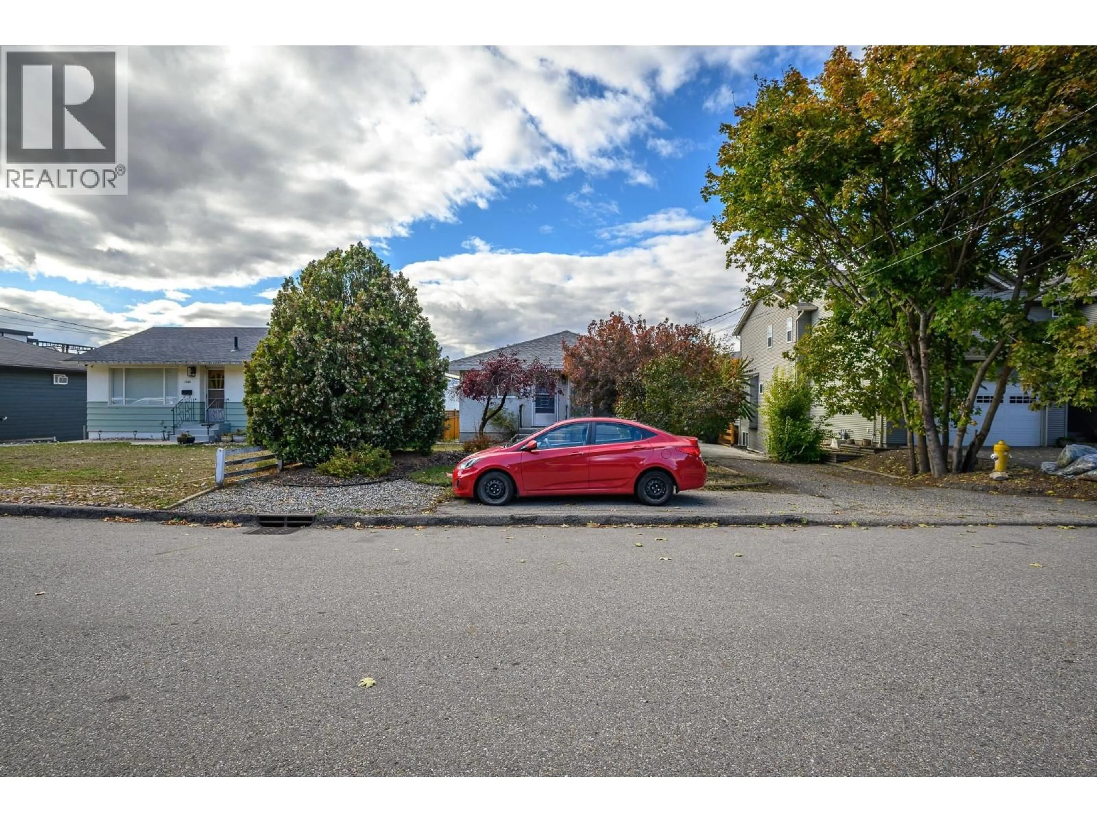 A pic from outside/outdoor area/front of a property/back of a property/a pic from drone, street for 3302 24 STREET, Vernon British Columbia V1T4N6