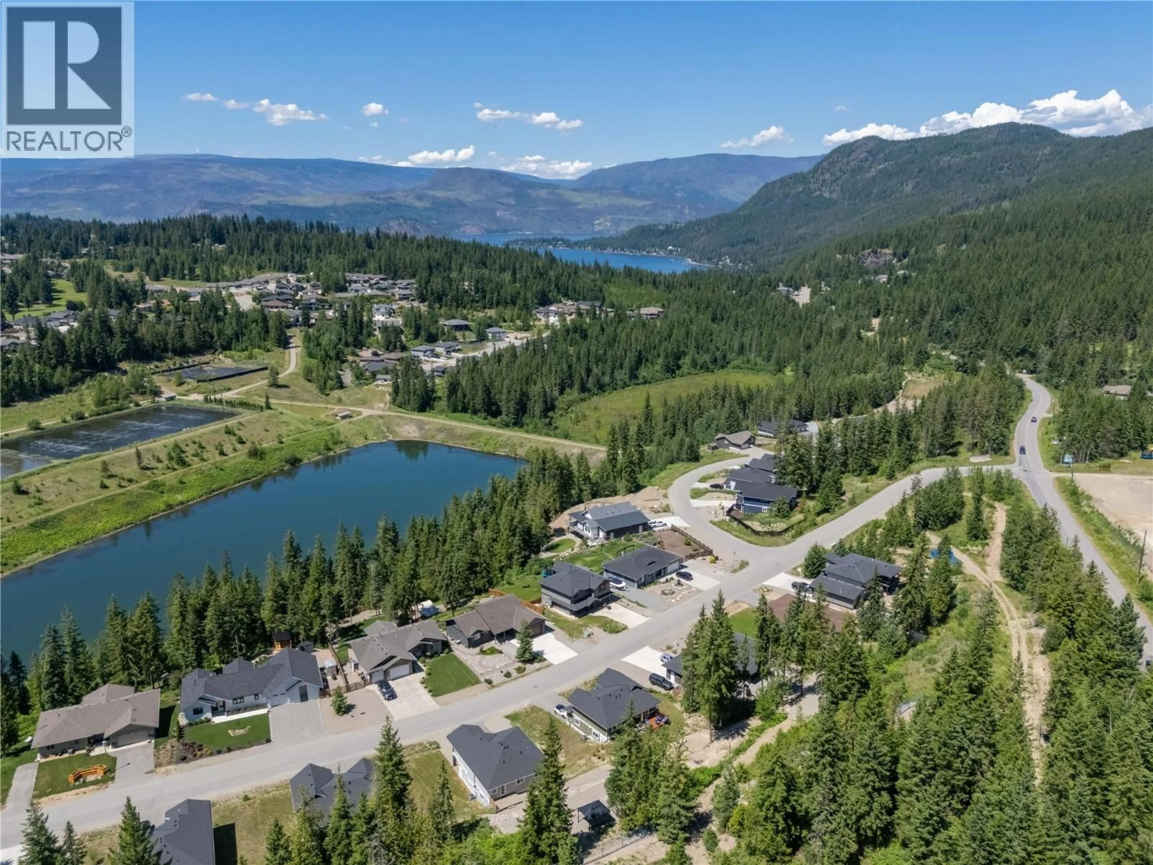 A pic from outside/outdoor area/front of a property/back of a property/a pic from drone, mountain view for 2868 GOLF COURSE DRIVE, Blind Bay British Columbia B0E1H2