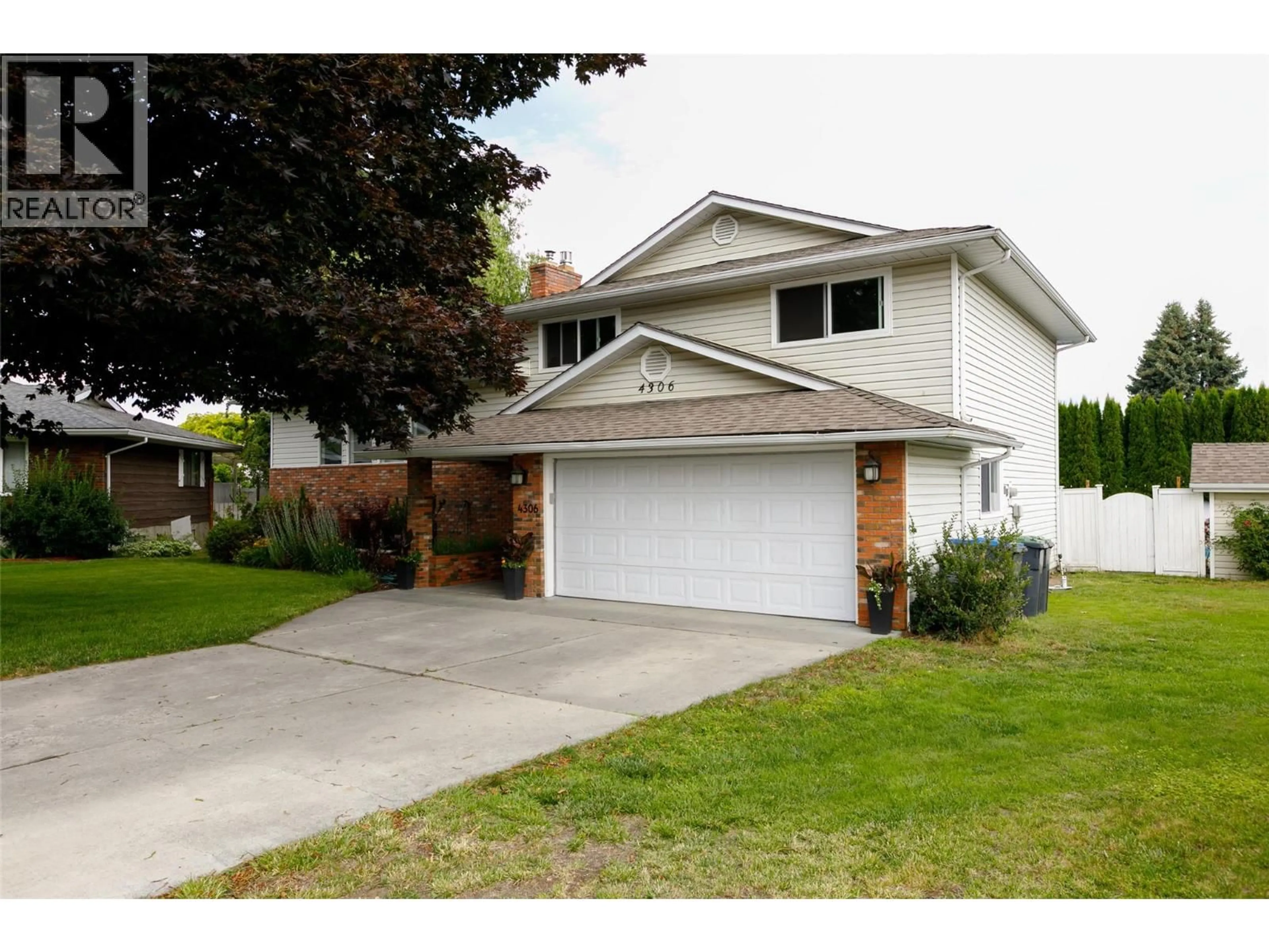 Home with vinyl exterior material, street for 4306 SAN MICHELLE COURT, Kelowna British Columbia V1W2J3