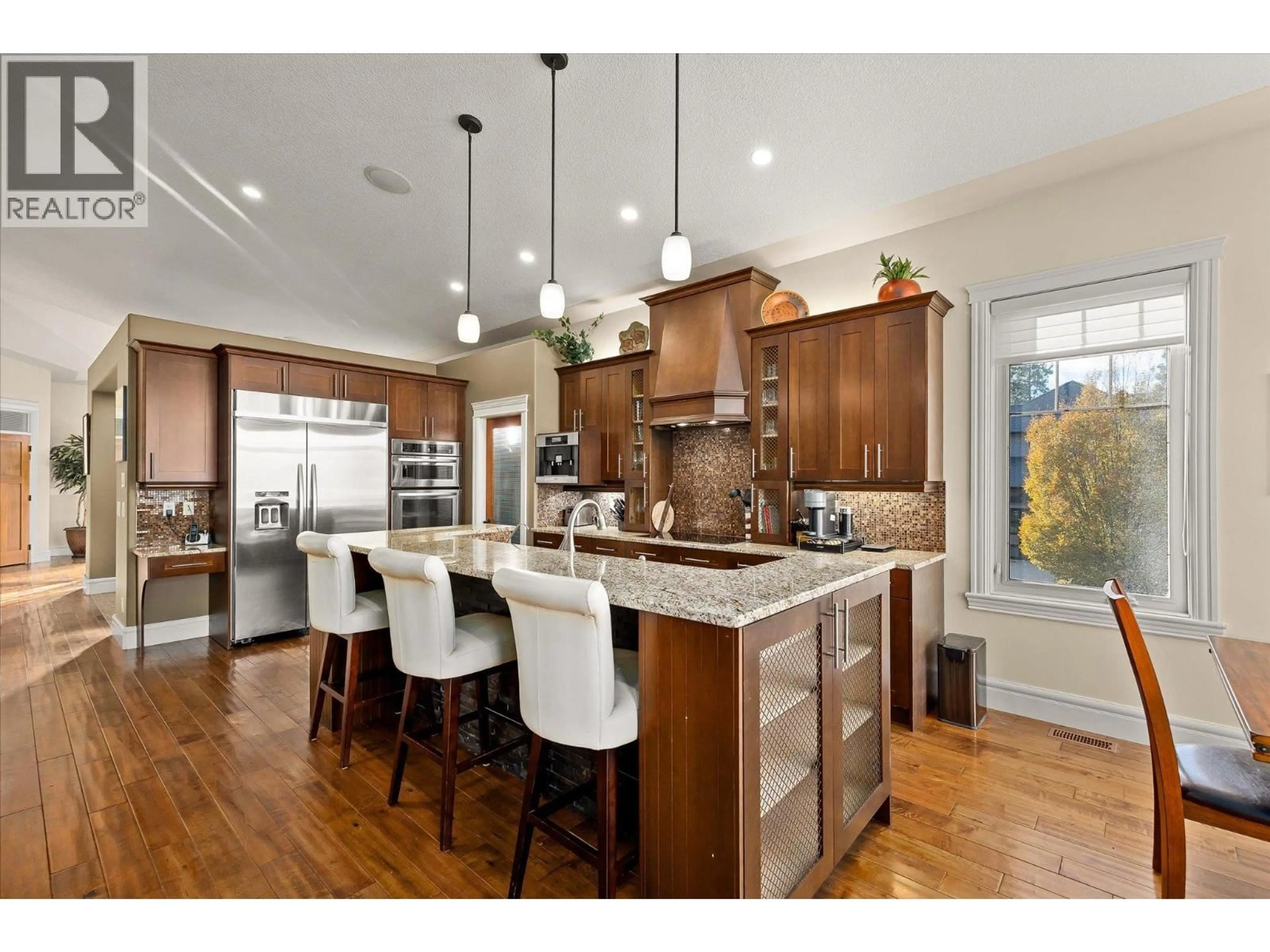 Open concept kitchen, wood/laminate floor for 603 ARBOR VIEW DRIVE, Kelowna British Columbia V1W4Z7