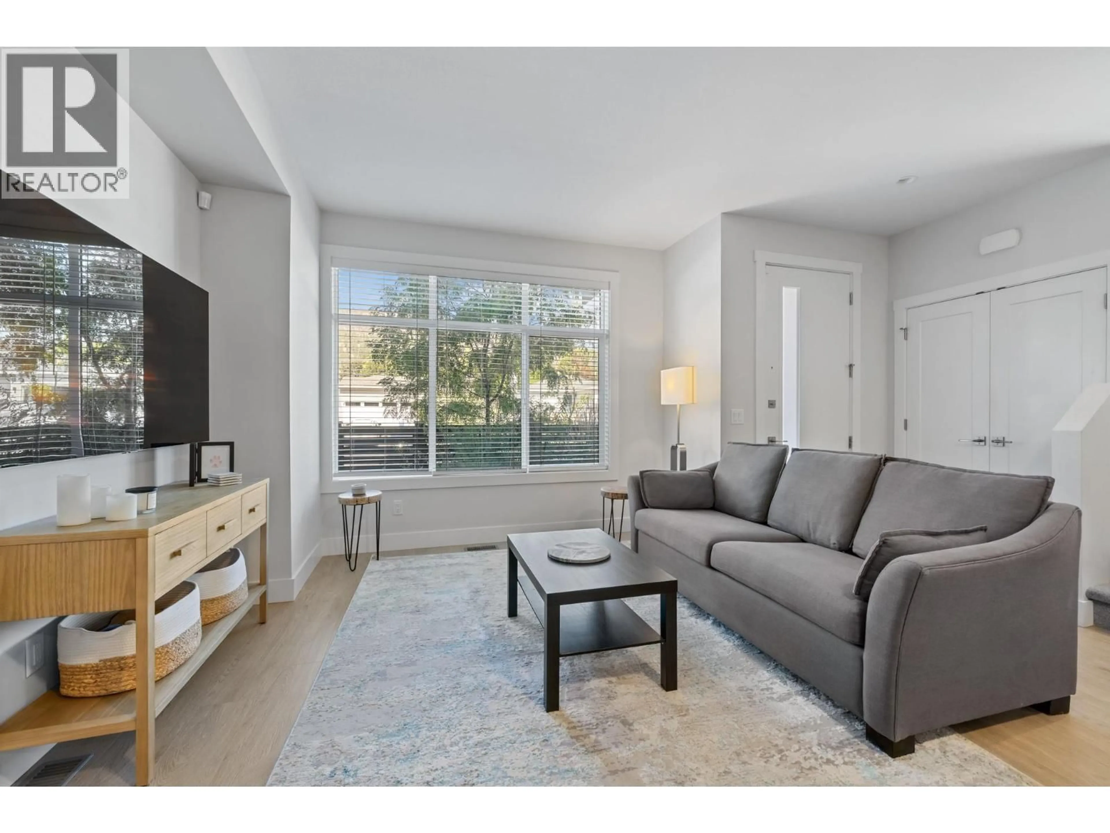 Living room with furniture, unknown for 12 - 115 WYNDHAM CRESCENT, Kelowna British Columbia V1V1Z2